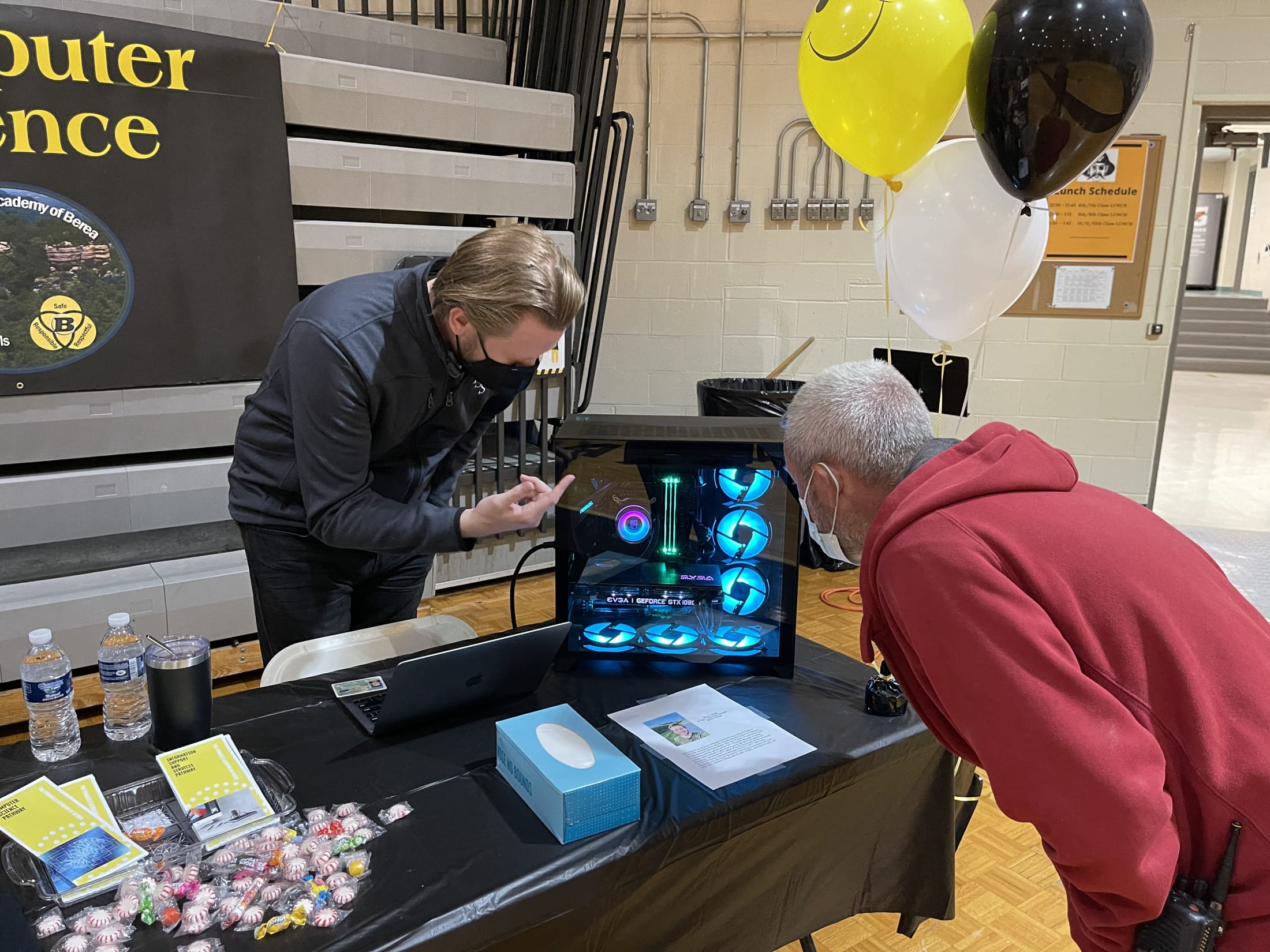 Teacher on a stand Welcoming  to The Pinnacle Academy of Berea 