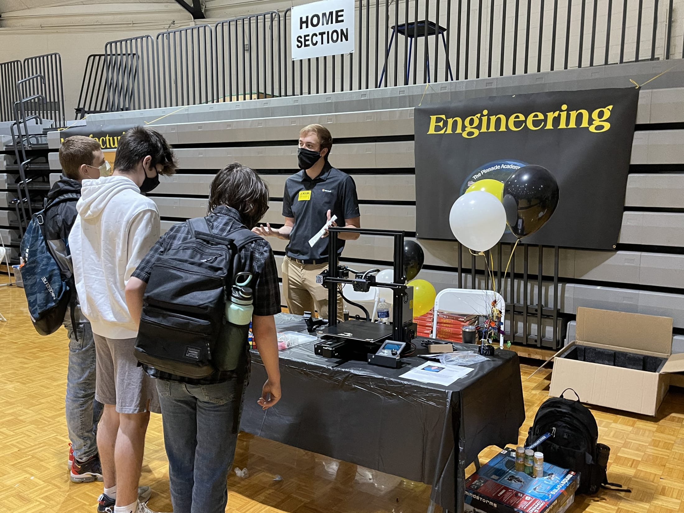 Teacher on a stand Welcoming  to The Pinnacle Academy of Berea 