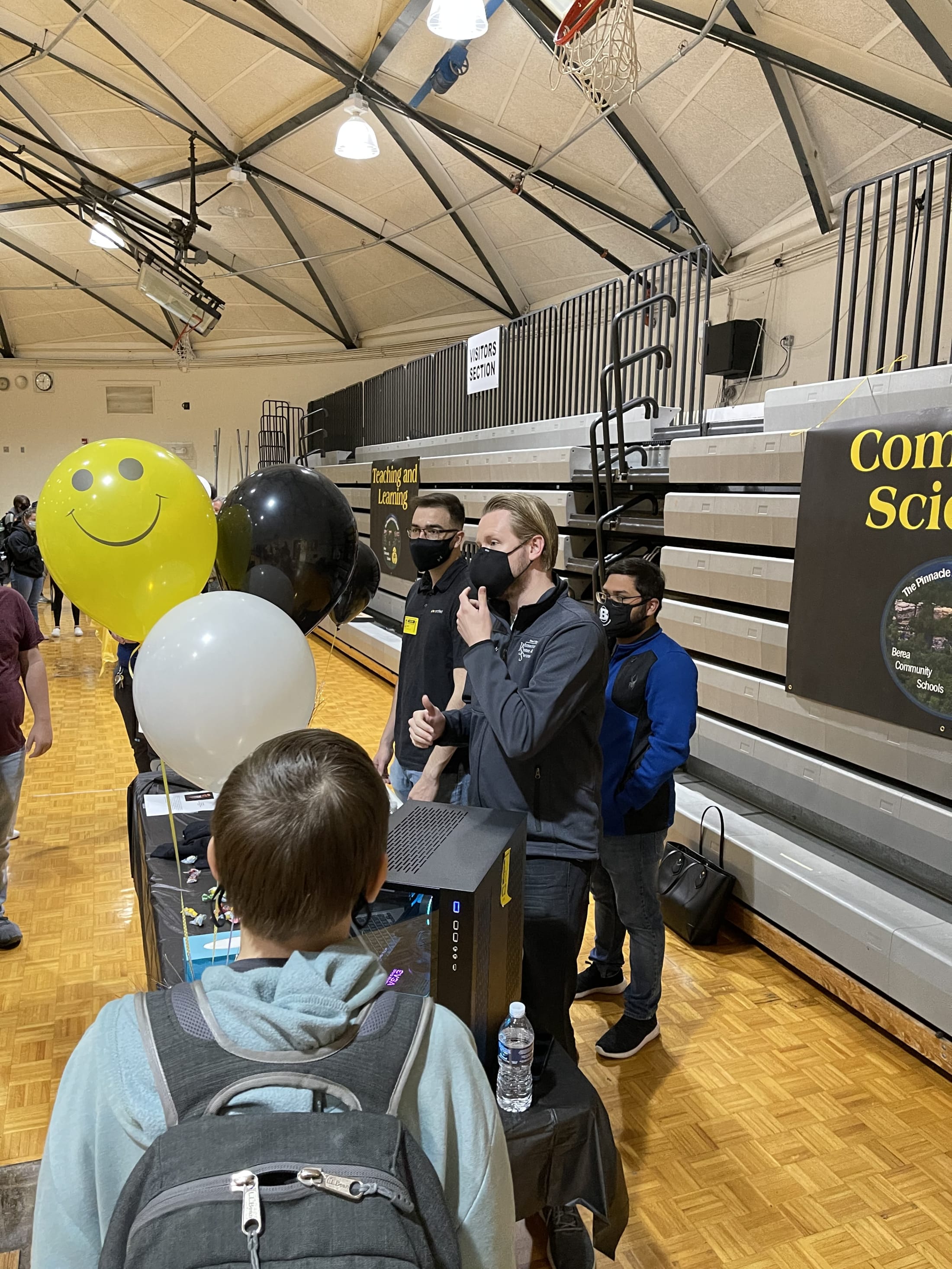 Teacher on a stand Welcoming  to The Pinnacle Academy of Berea 
