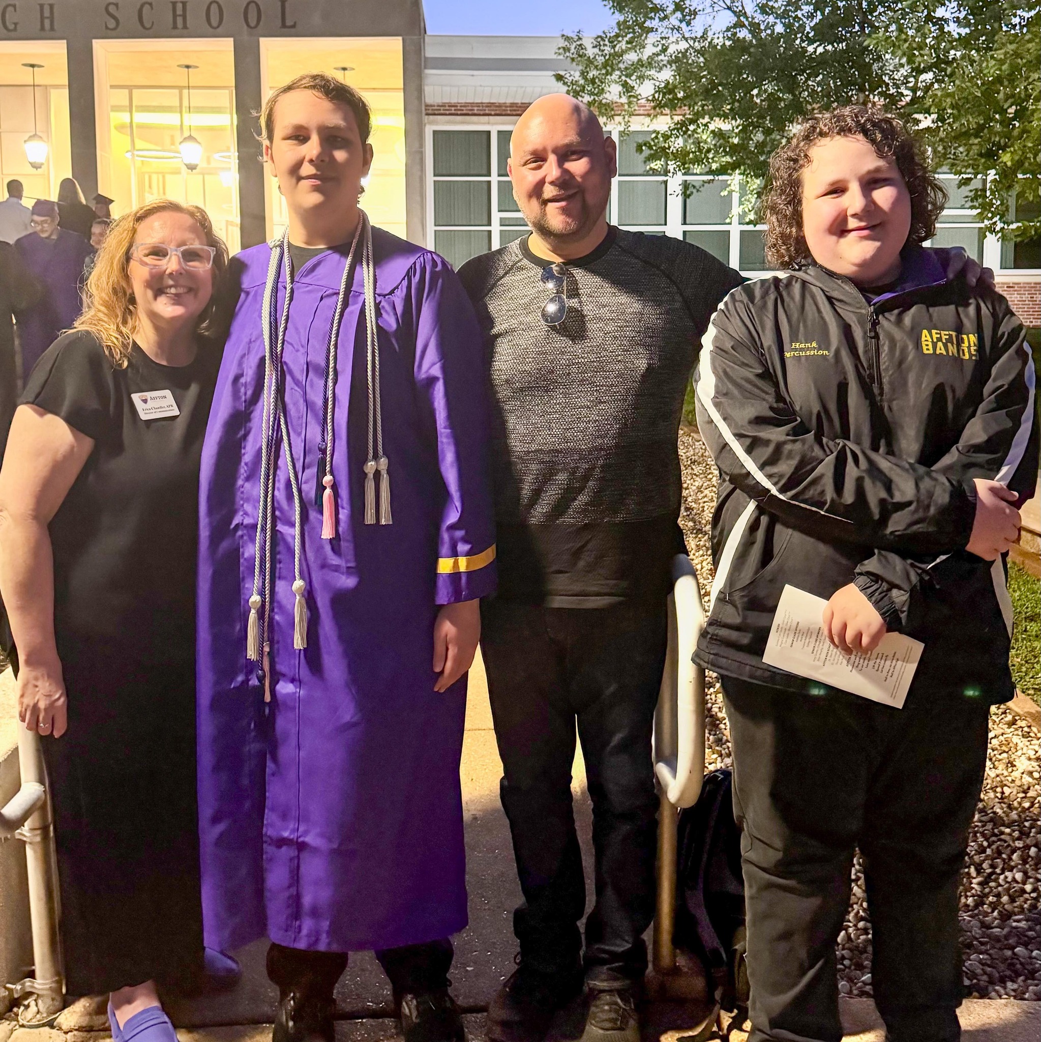 Chandler family pictured at Affton High School graduation with Erica, Milo, Aaron, and Hank