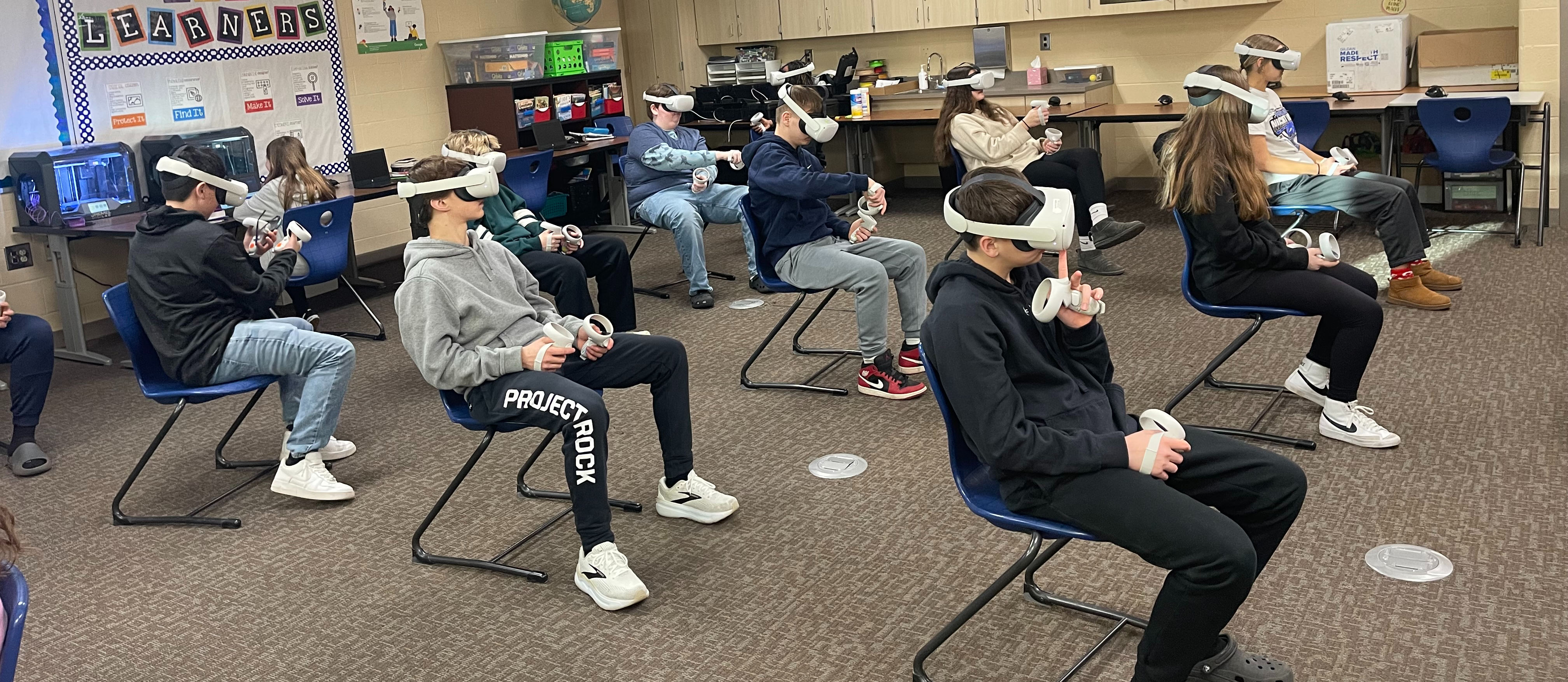 VR headsets being used by 8th graders