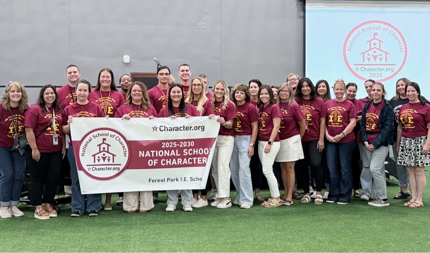 Forest Park staff with National School of Character banner