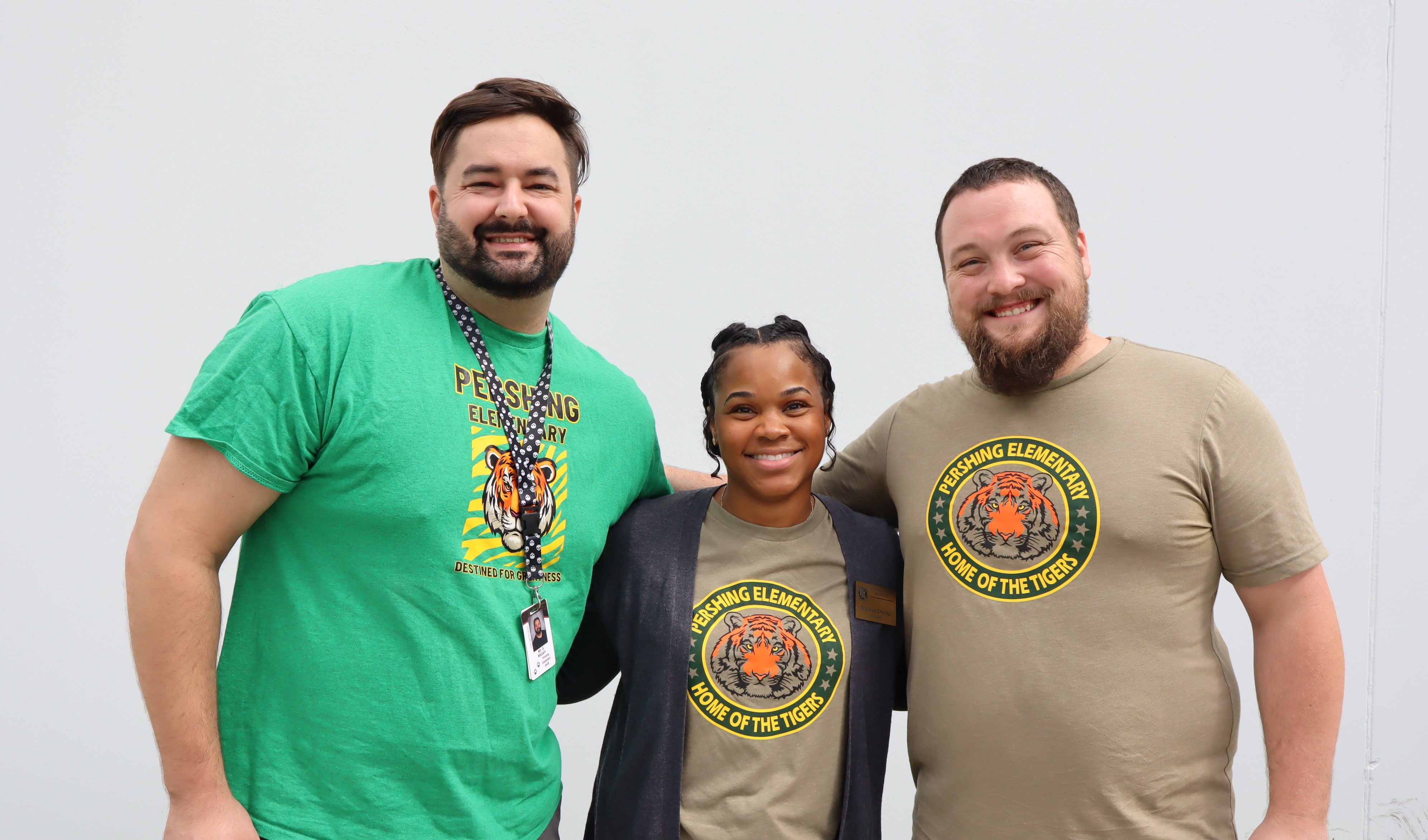 principal with two staff members
