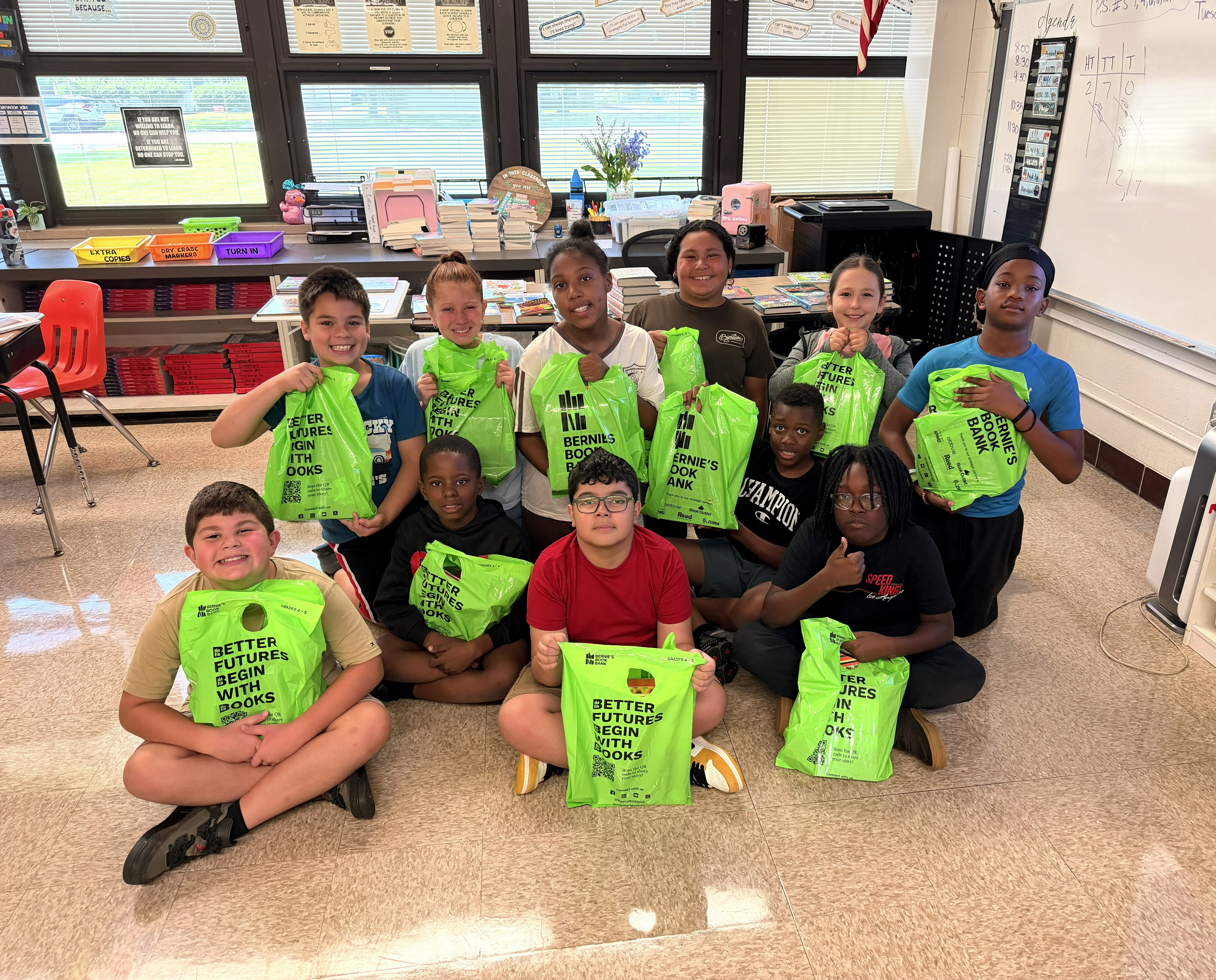 Students with Bernie's Book Bank donations