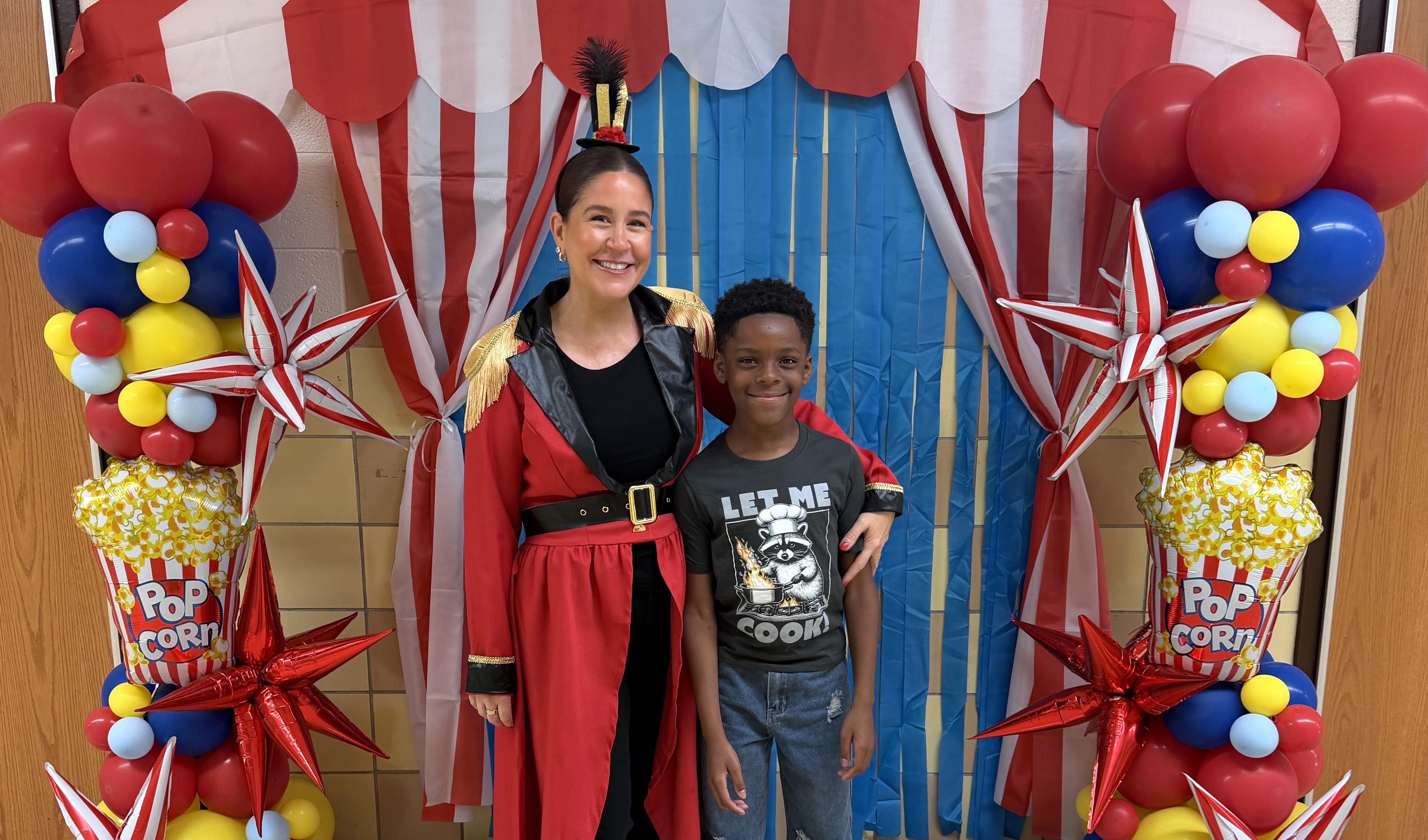 Student and Principal on first day of school