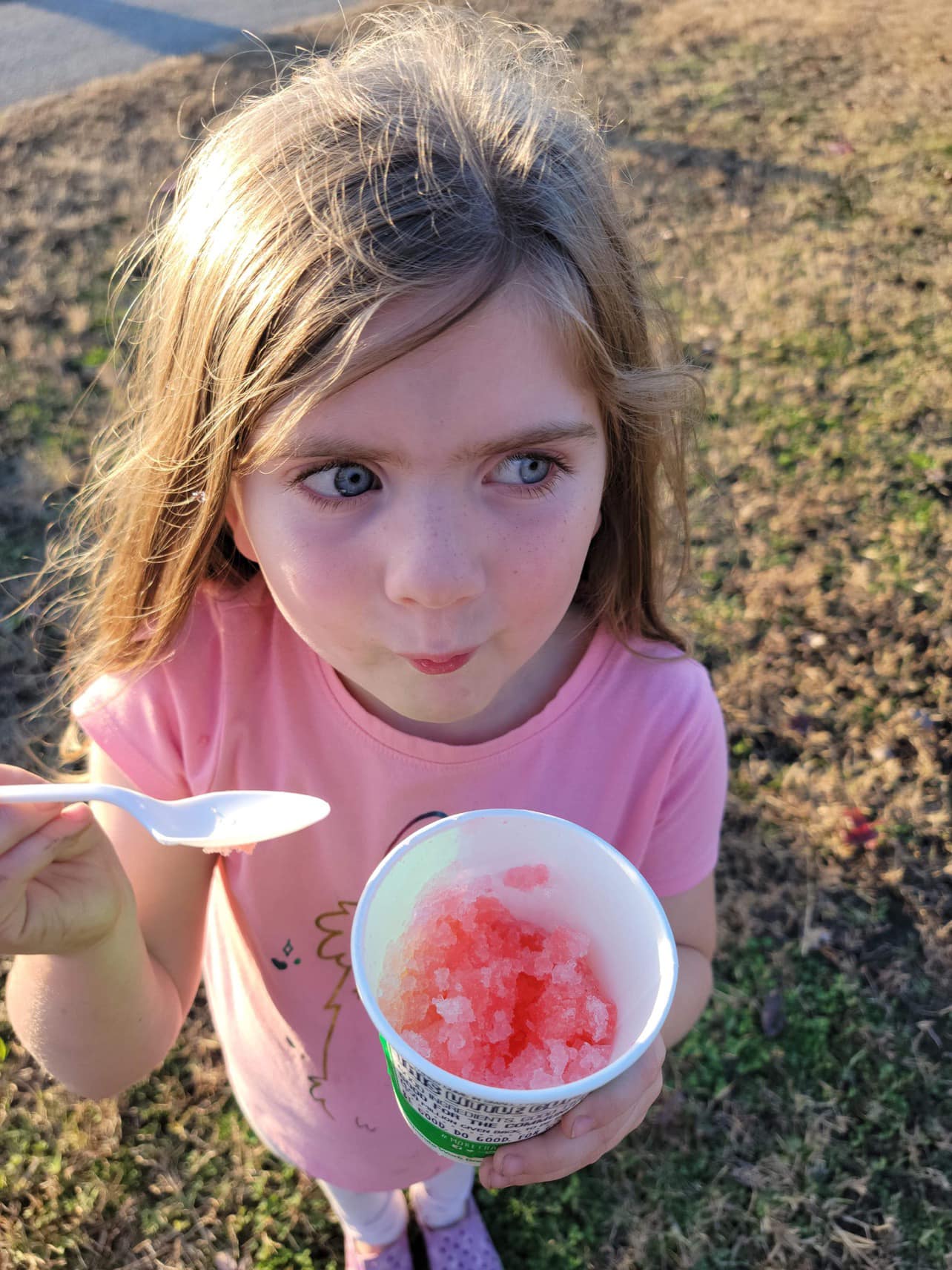 Student with a red snow cone