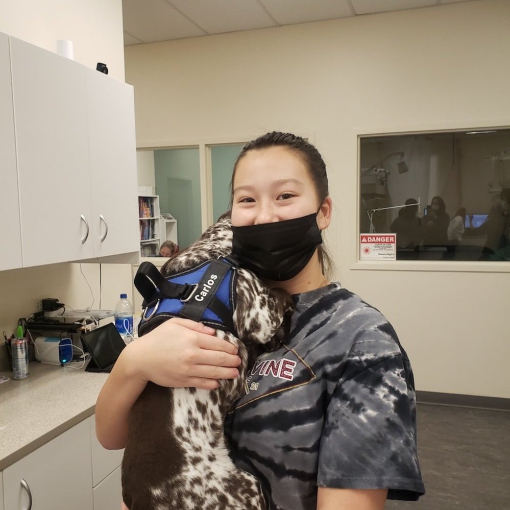 student with a dog