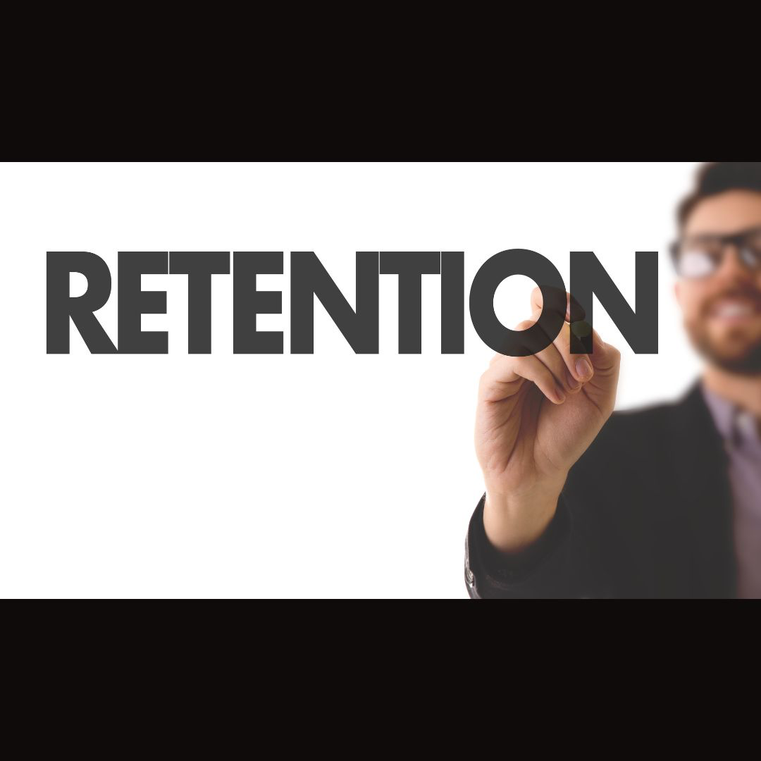 retention being written by man on screen