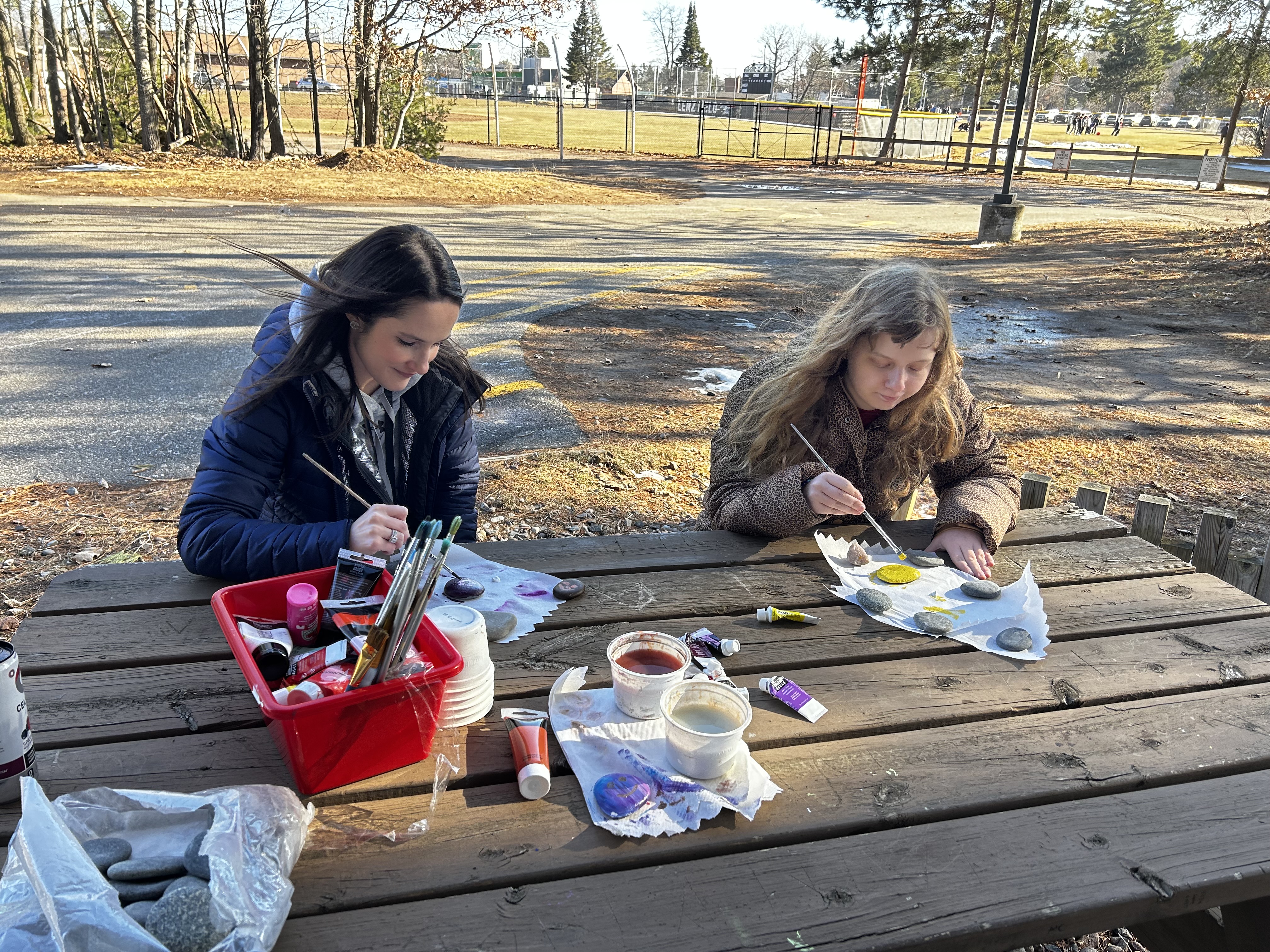 teacher and student painting