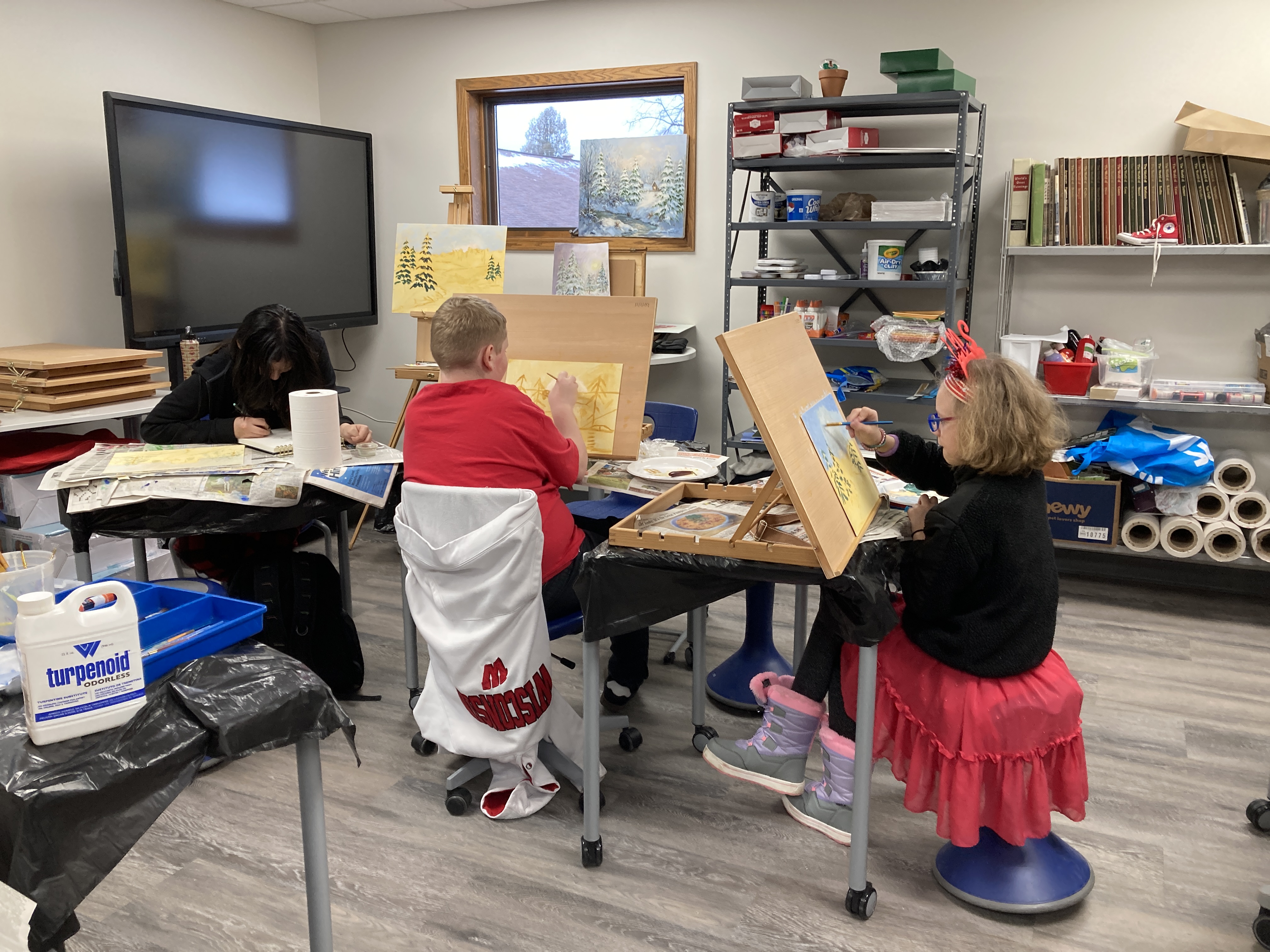 students working on their art projects