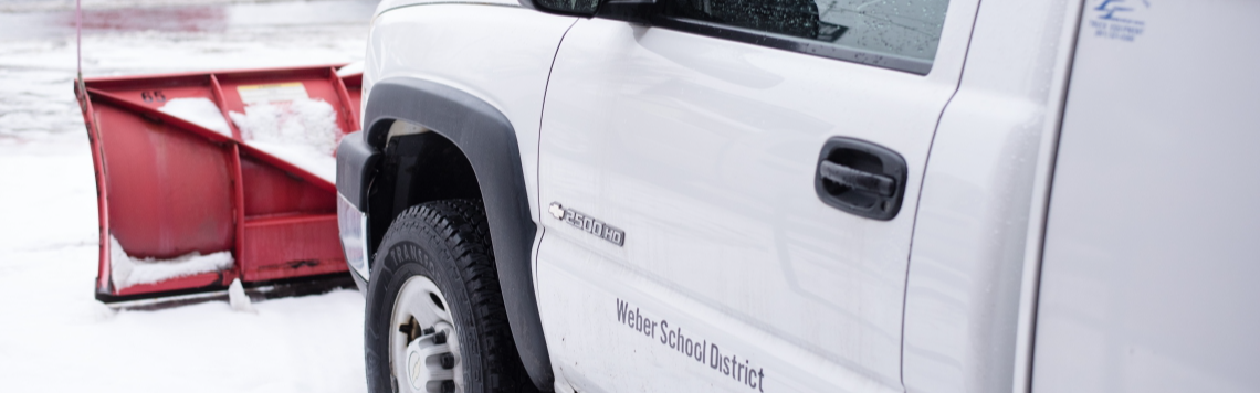 Decorative: Photo of truck with snow plow