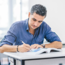 Picture of an adult student at a desk