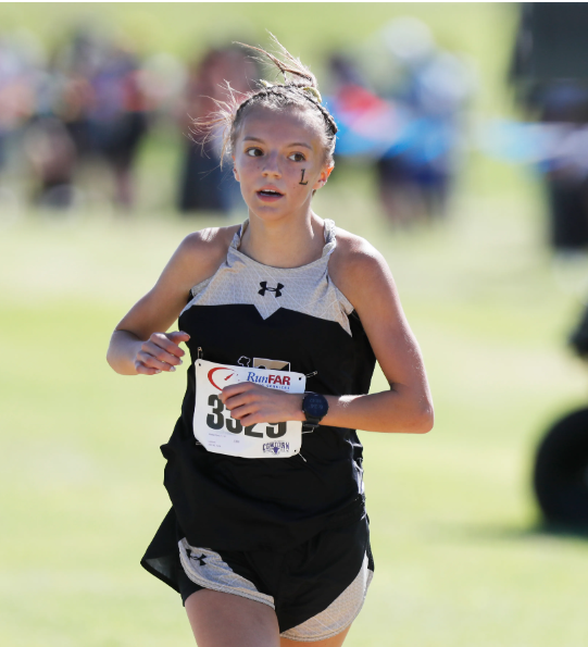 Reese Pena  running cross country at the 2023 Lubbock Invitational Cross Country Meet