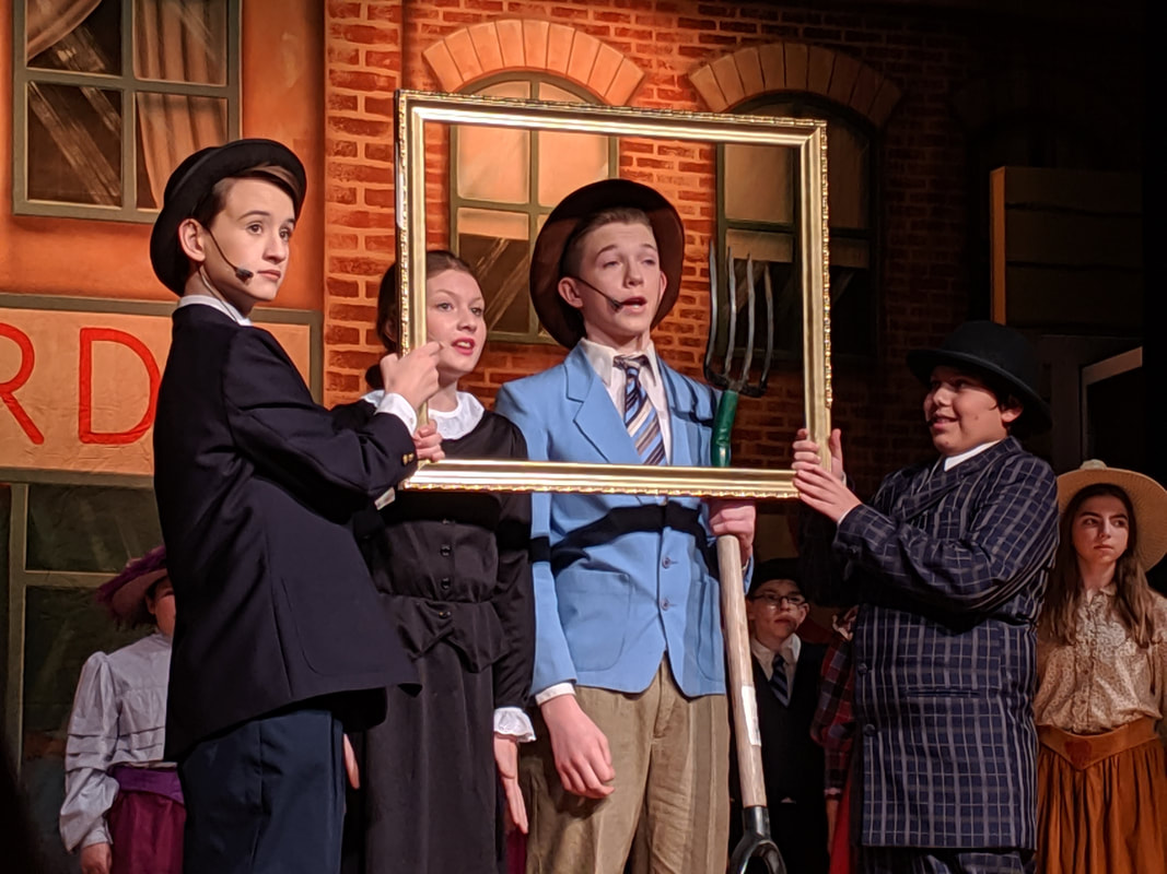 The Music Man framed chorus members