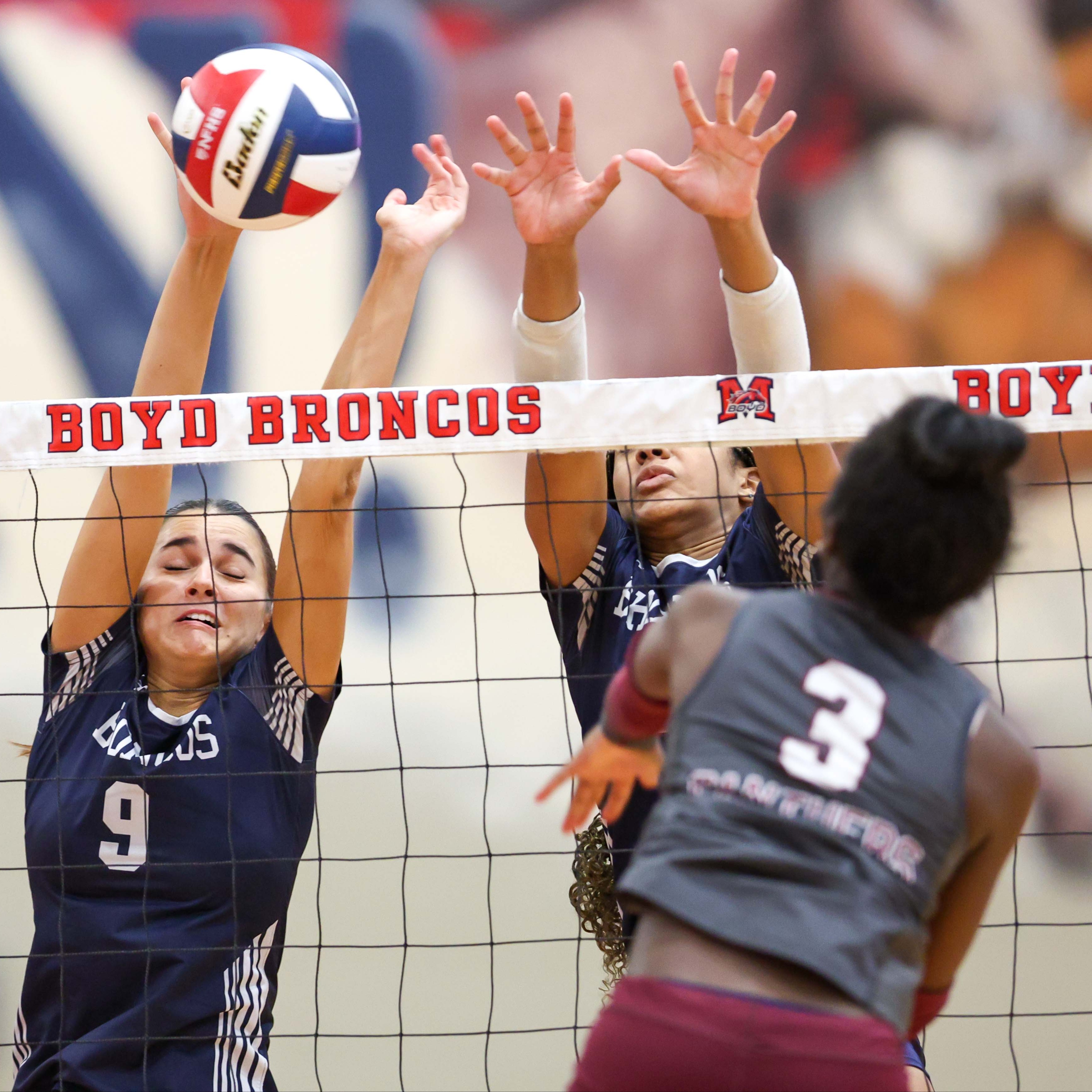 Kiera Bose and Trinity Johnson blocking against Princeton outside hitter