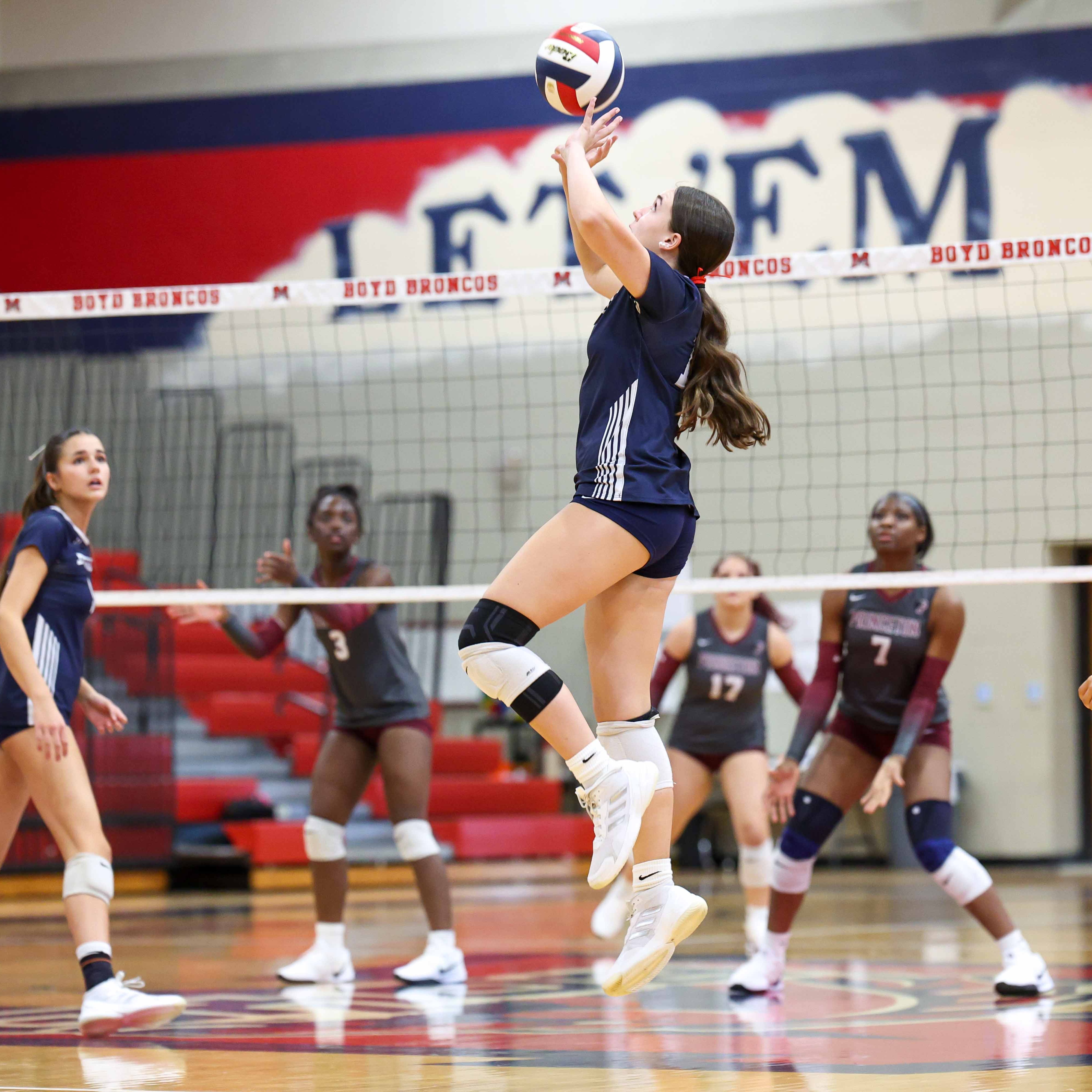 Gabby Fiori setting to her outside hitter vs. Princeton