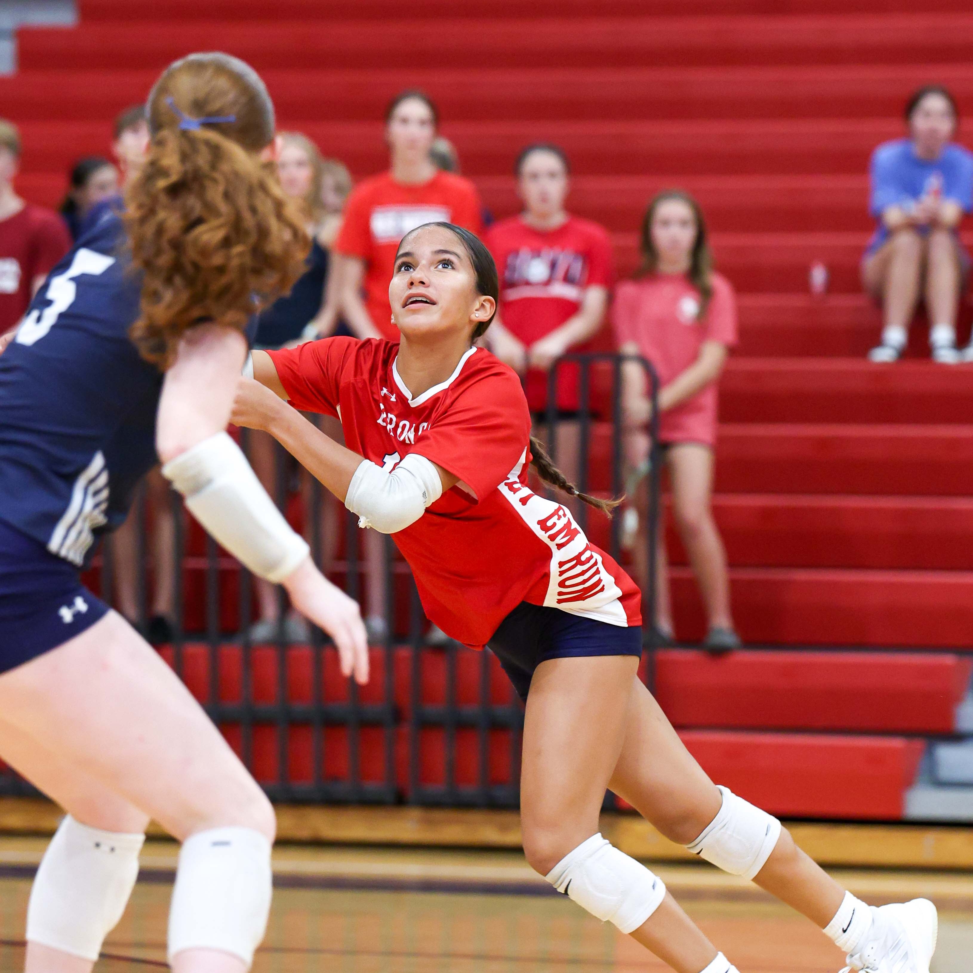 Ashley Ruschill and Coleen McCall playing defense in the back row vs. Princeton