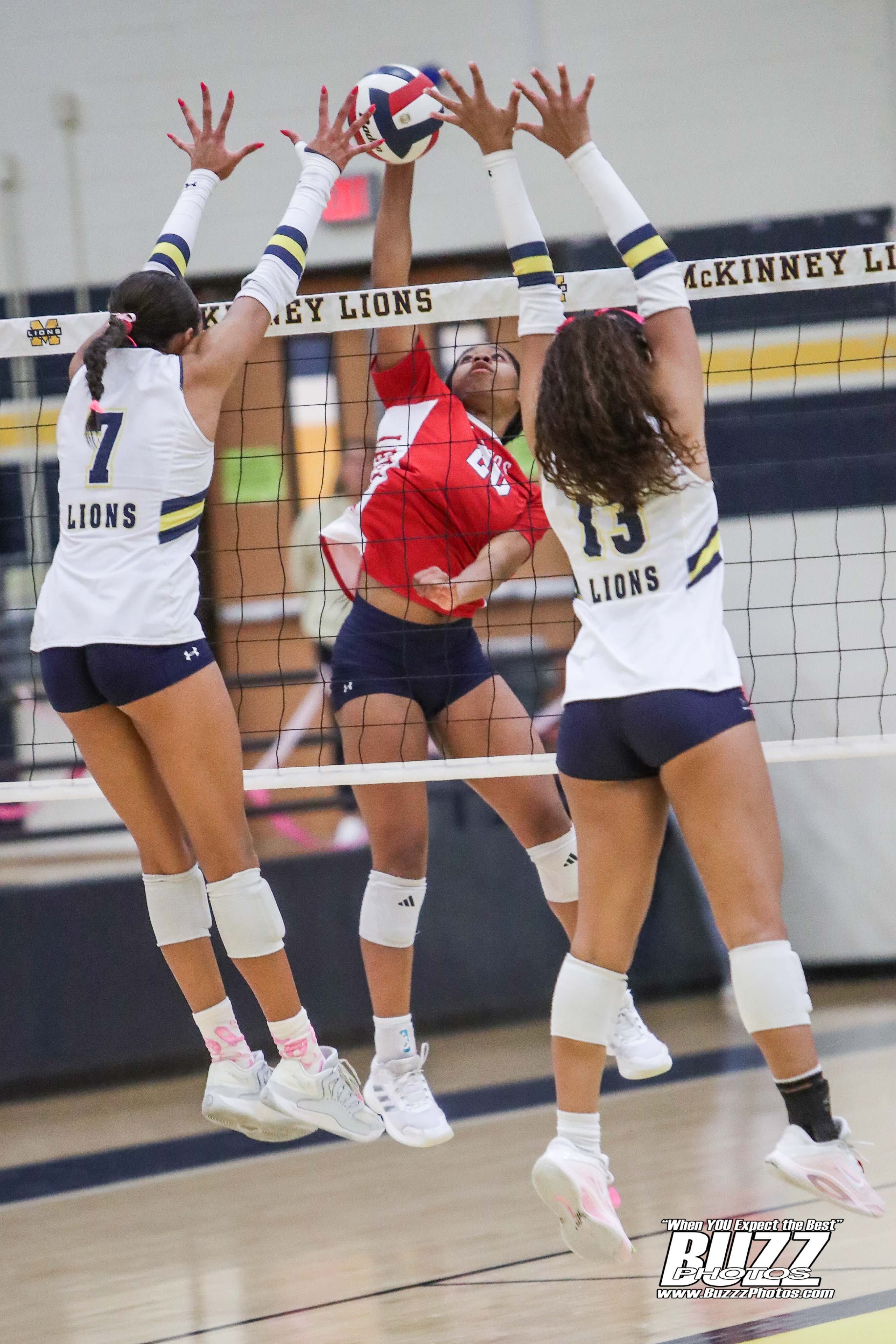 Nicole Igo Opurum swinging on the right side against McKinney High School 