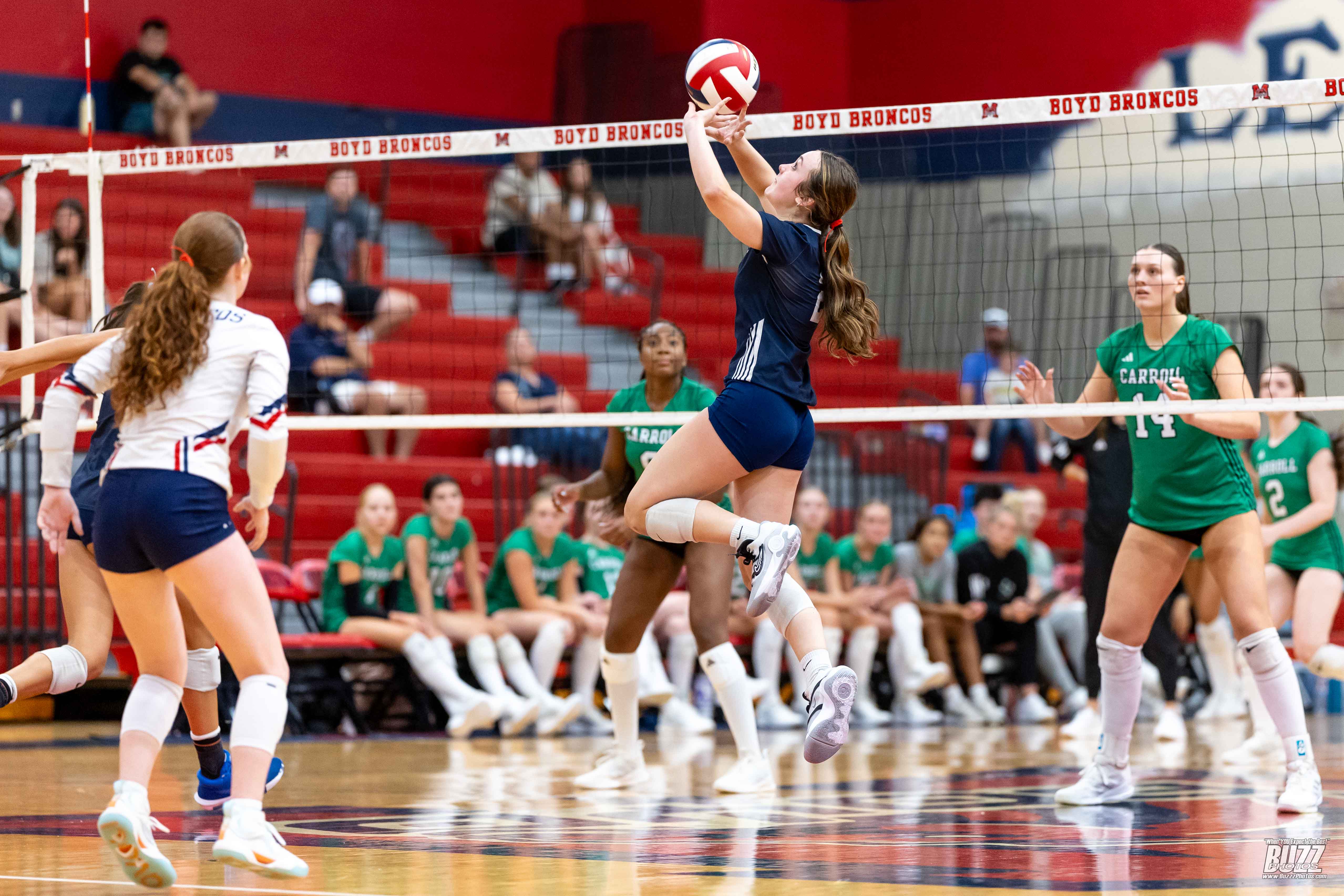 Paige Baudino setting to her outside hitter