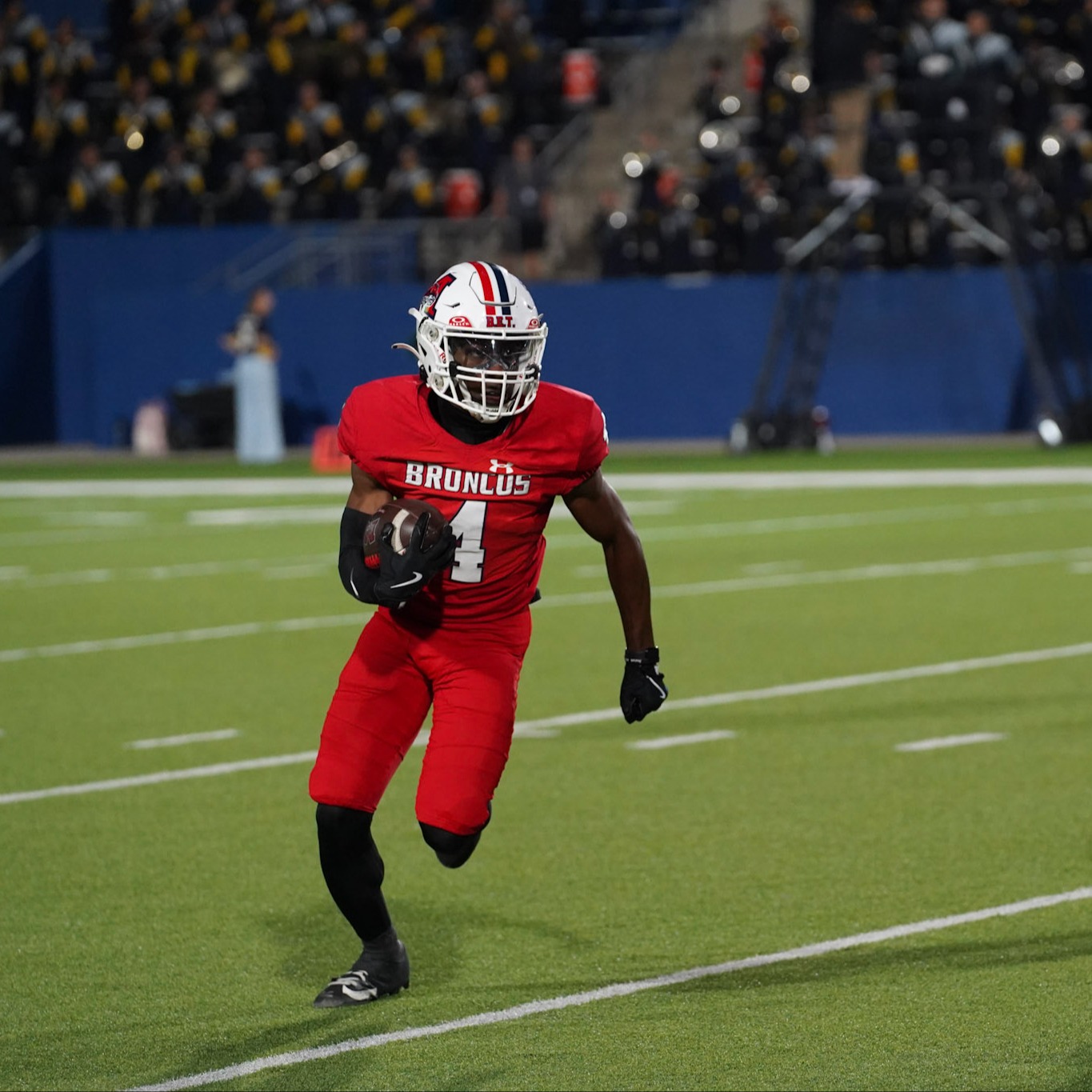 Football player running with the ball