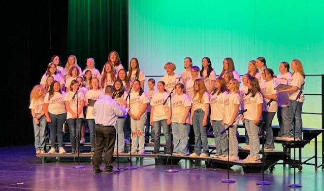 Will Rogers Junior High Choir performs on risers on the main stage at Robson Performing Arts Center