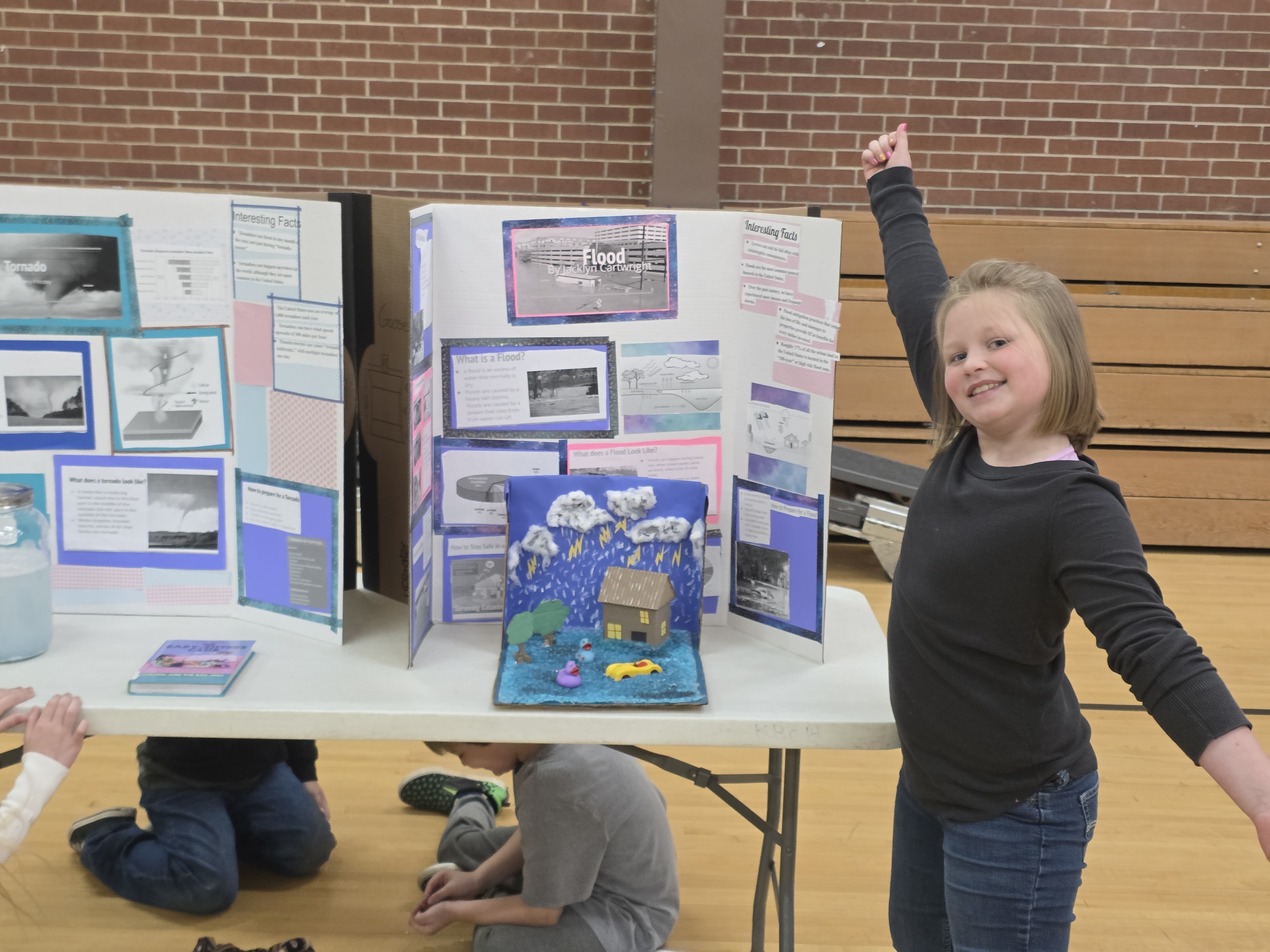 students presenting science fair projects