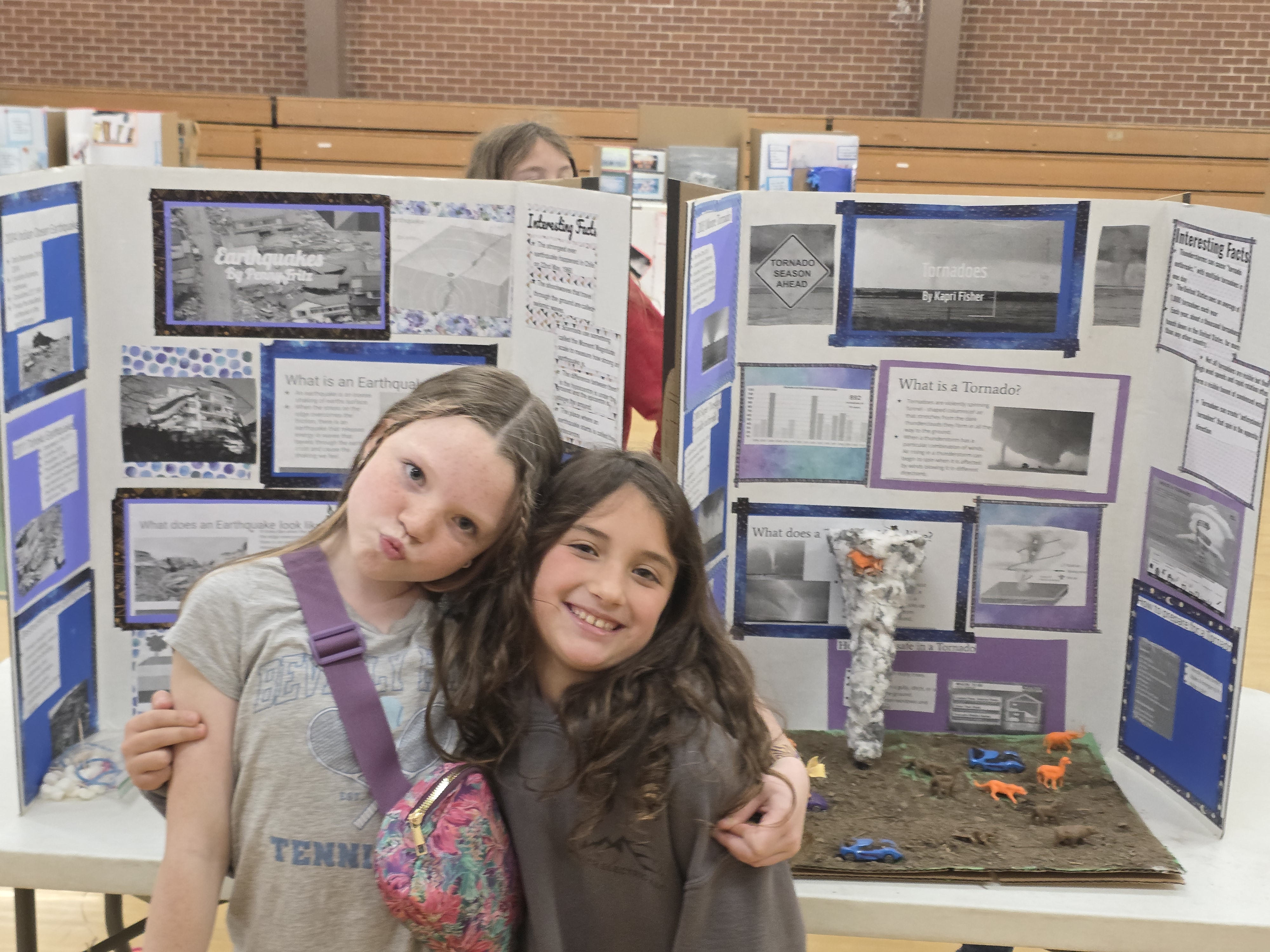 students presenting science fair projects