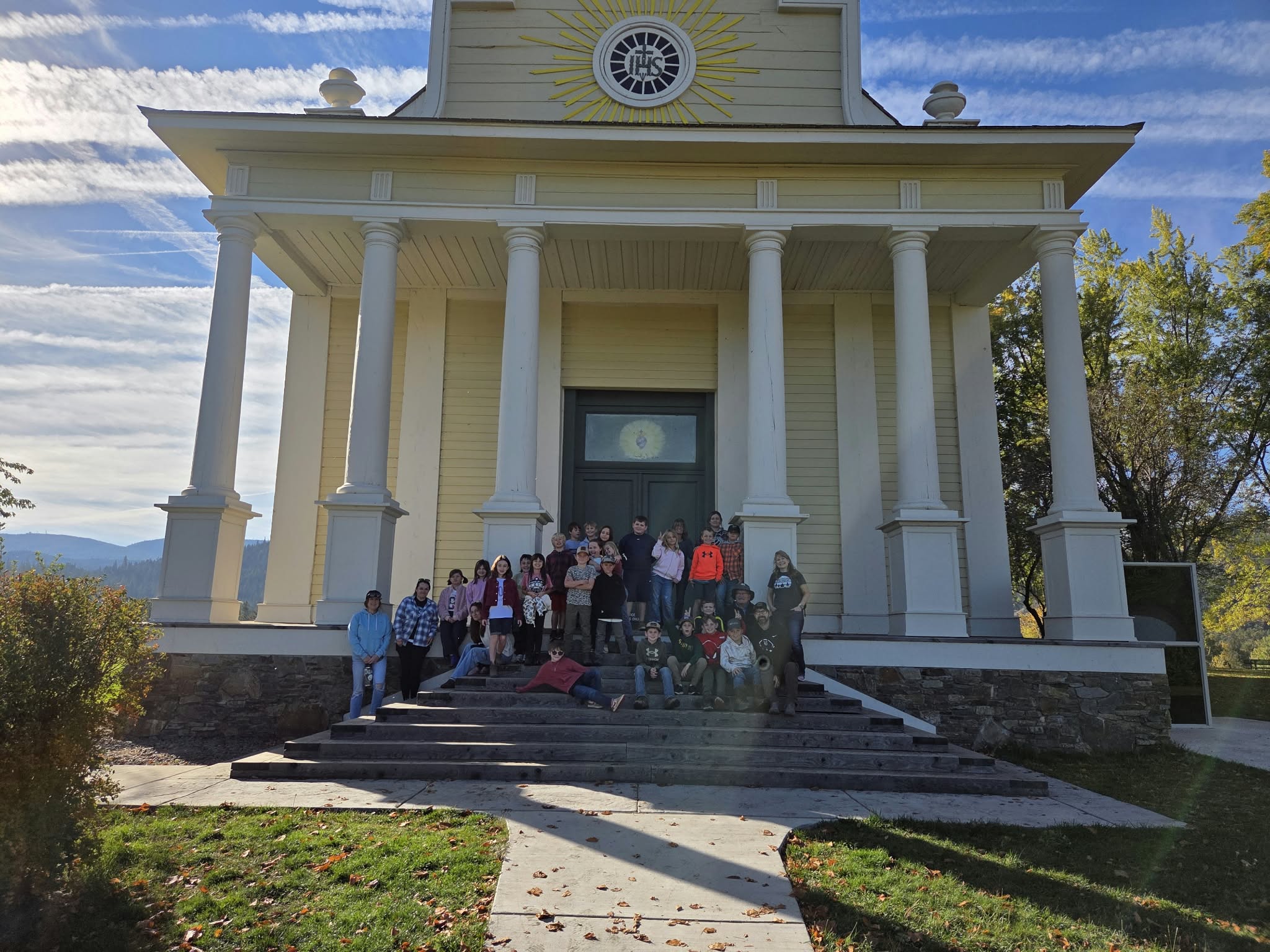 kids in front of an old building