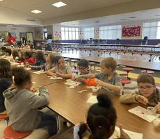 students in the classroom sitting and talking