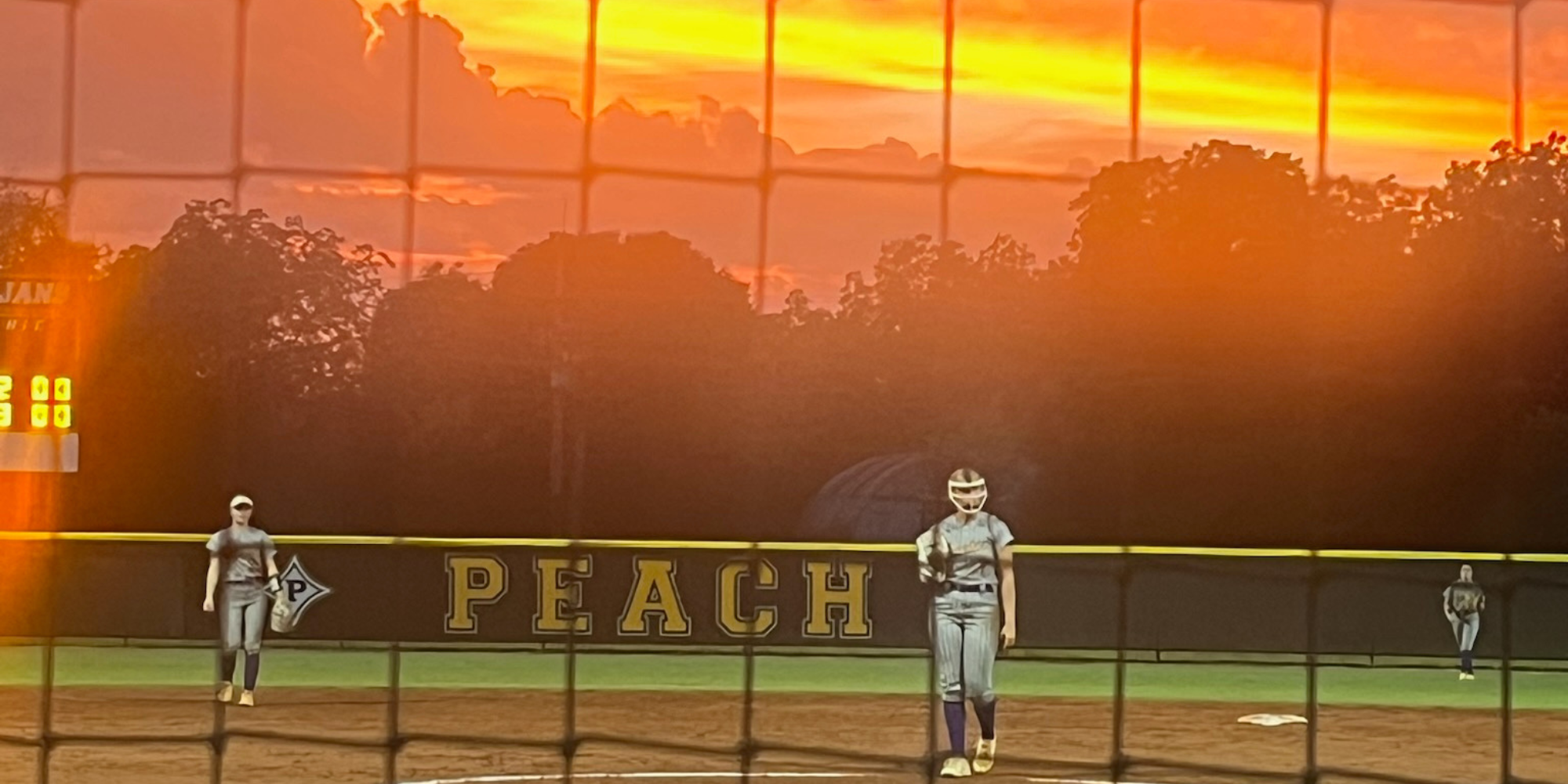 Sunset shot of the Lady Eagles playing at Peach County High School