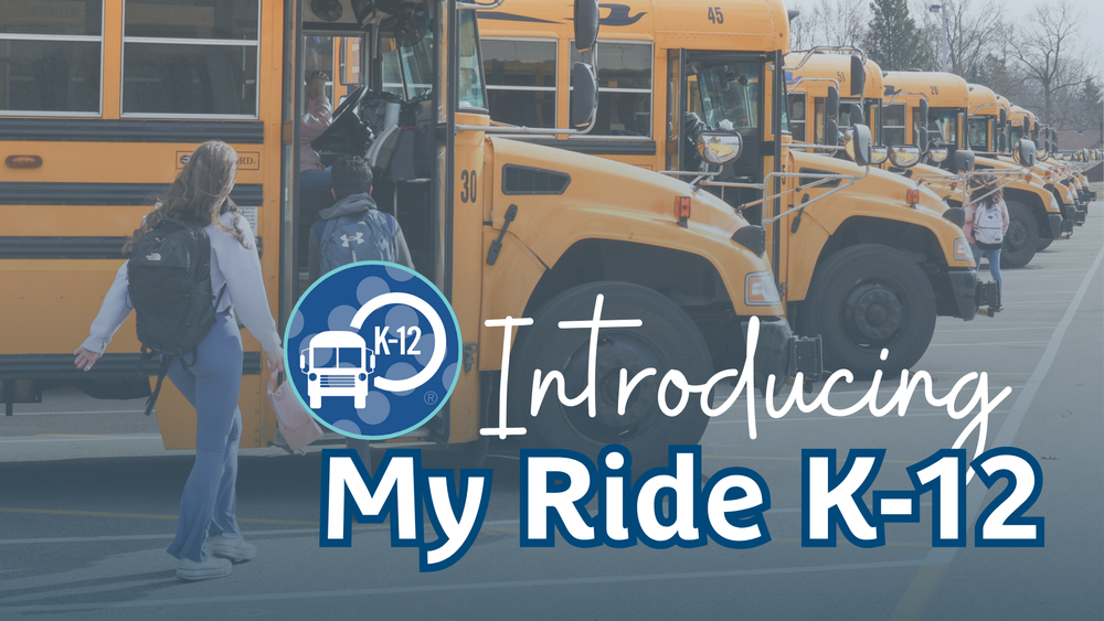 Promotional banner introducing the My Ride K-12 app. The background shows students boarding a row of yellow school buses. The My Ride K-12 logo appears in the foreground alongside the text 'Introducing My Ride K-12' in bold blue and white lettering.