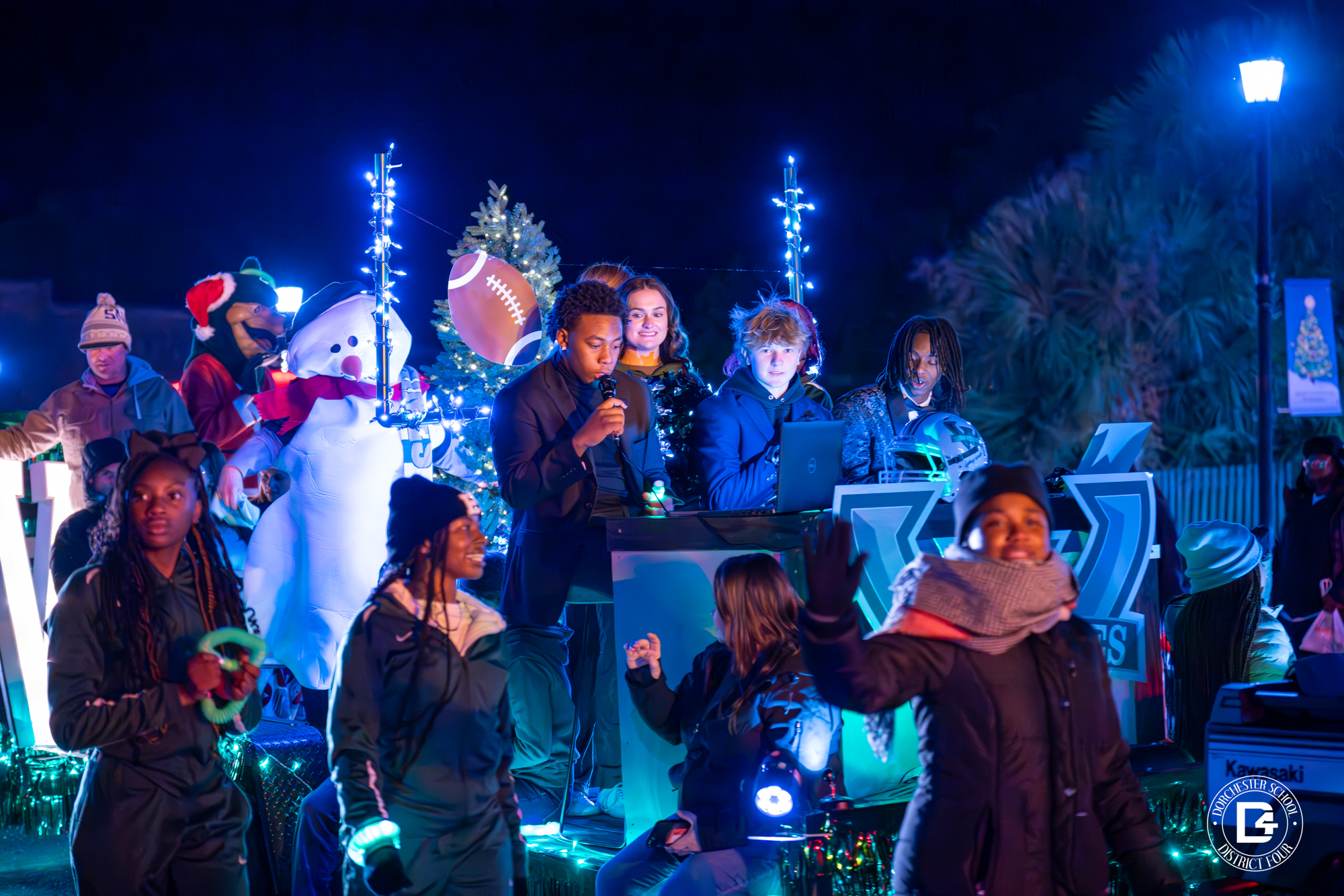 Students on christmas parade float