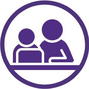 Teacher helping a student