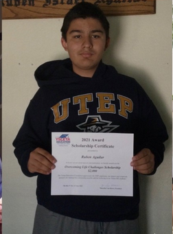 2021 recipient holding a diploma