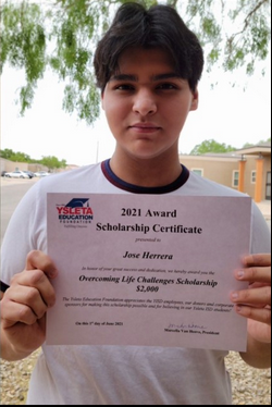 2021 recipient holding a diploma