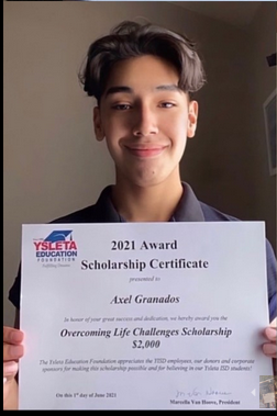 2021 recipient holding a diploma