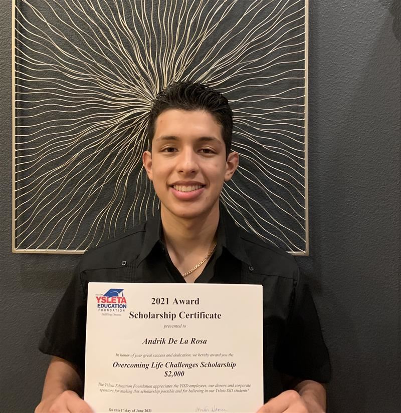 2021 recipient holding a diploma