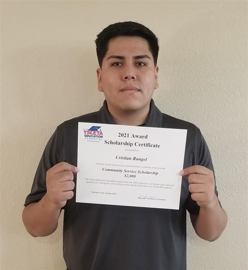 2021 recipient holding a diploma