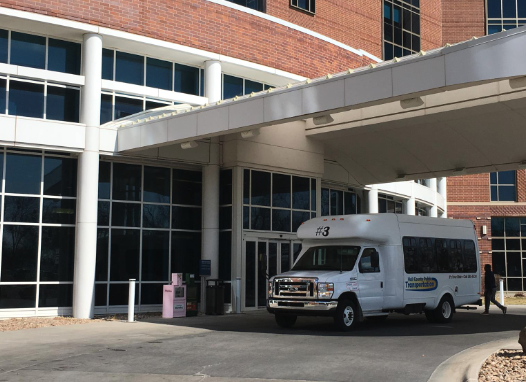 building and a van outside