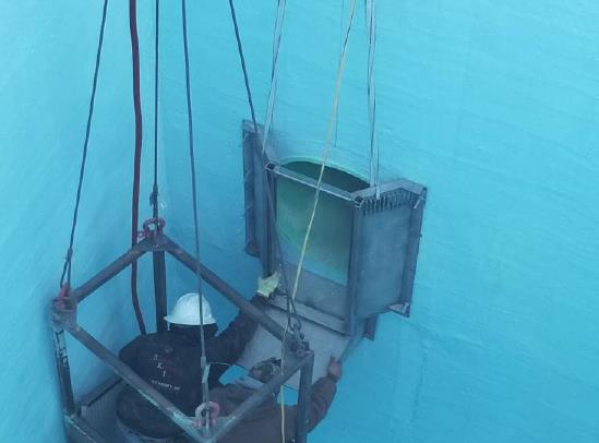 Diamond Engineering is working to install brackets for the Influent Grinding System.