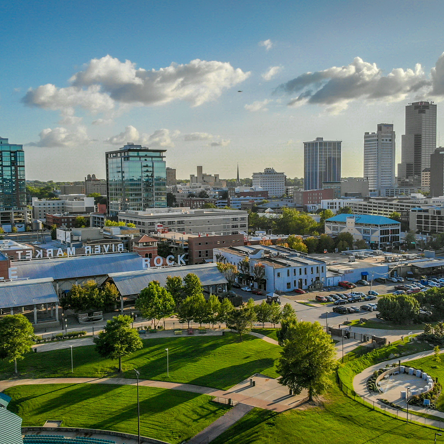 Downtown Little Rock with an elevated view of the River Market and a sunet of a beautiful day