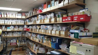 A room filled with lots of shelves filled with boxes
