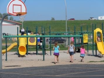 A group of children playing in a playground