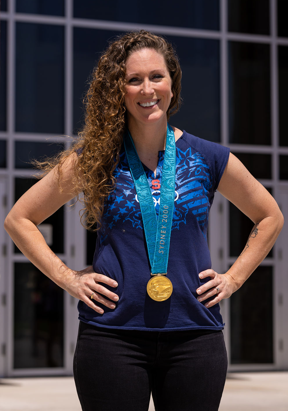 Laura Wilkinson wearing Olympic gold medal