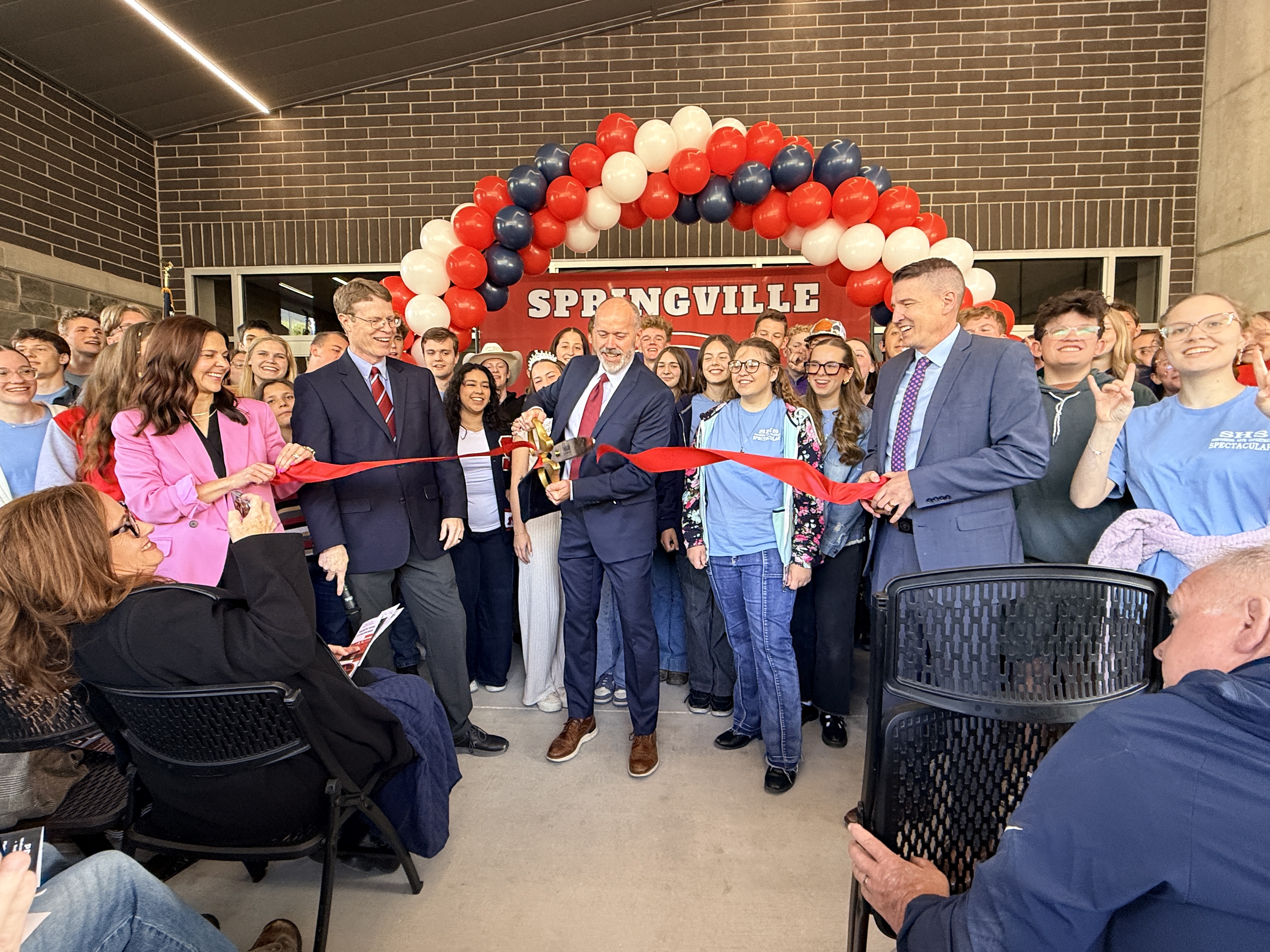 SHS ribbon being cut