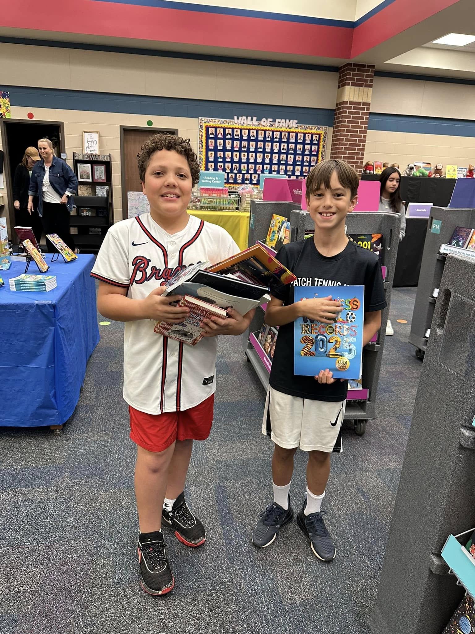 Students selecting books