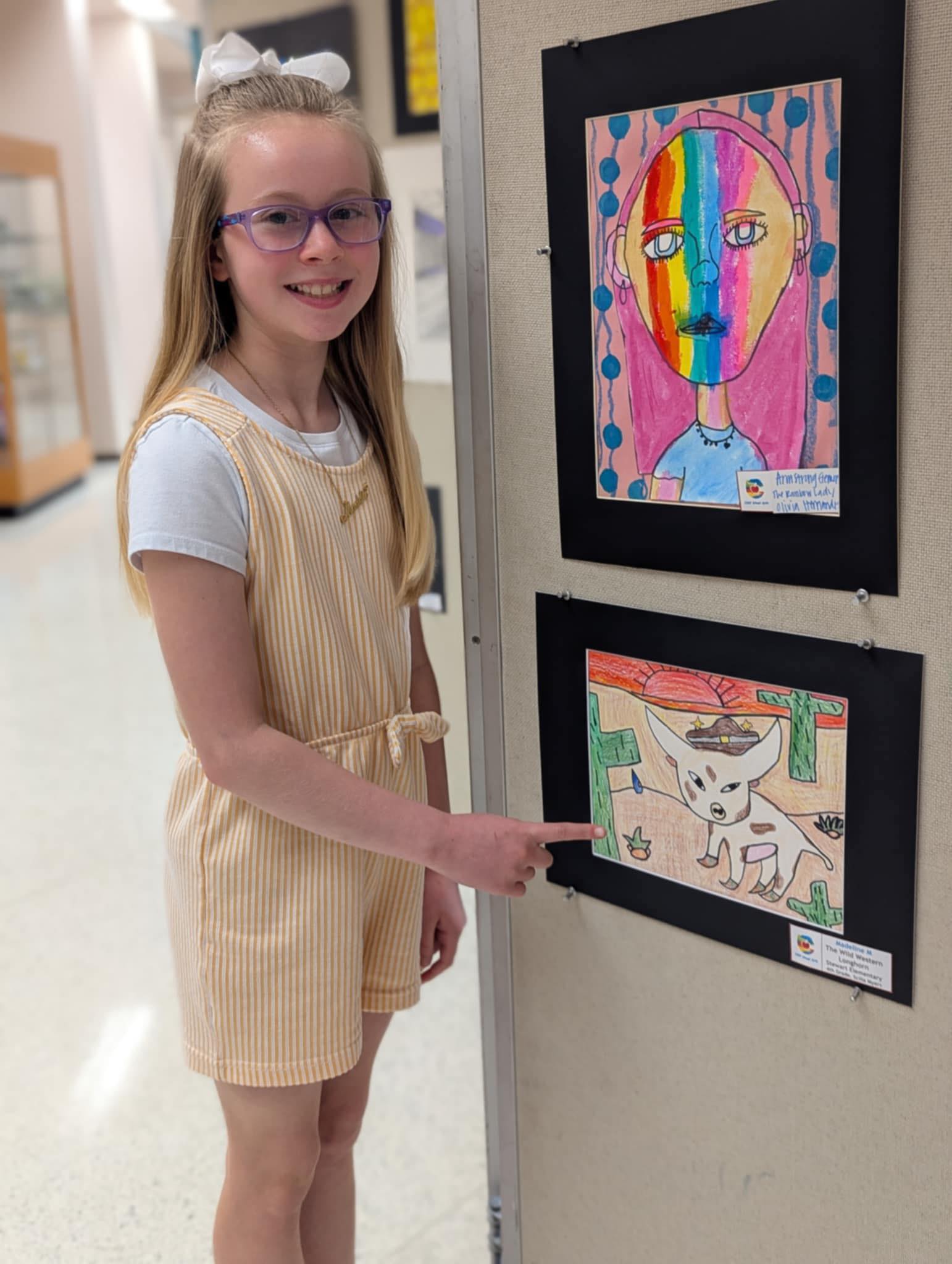 Art student showing her work