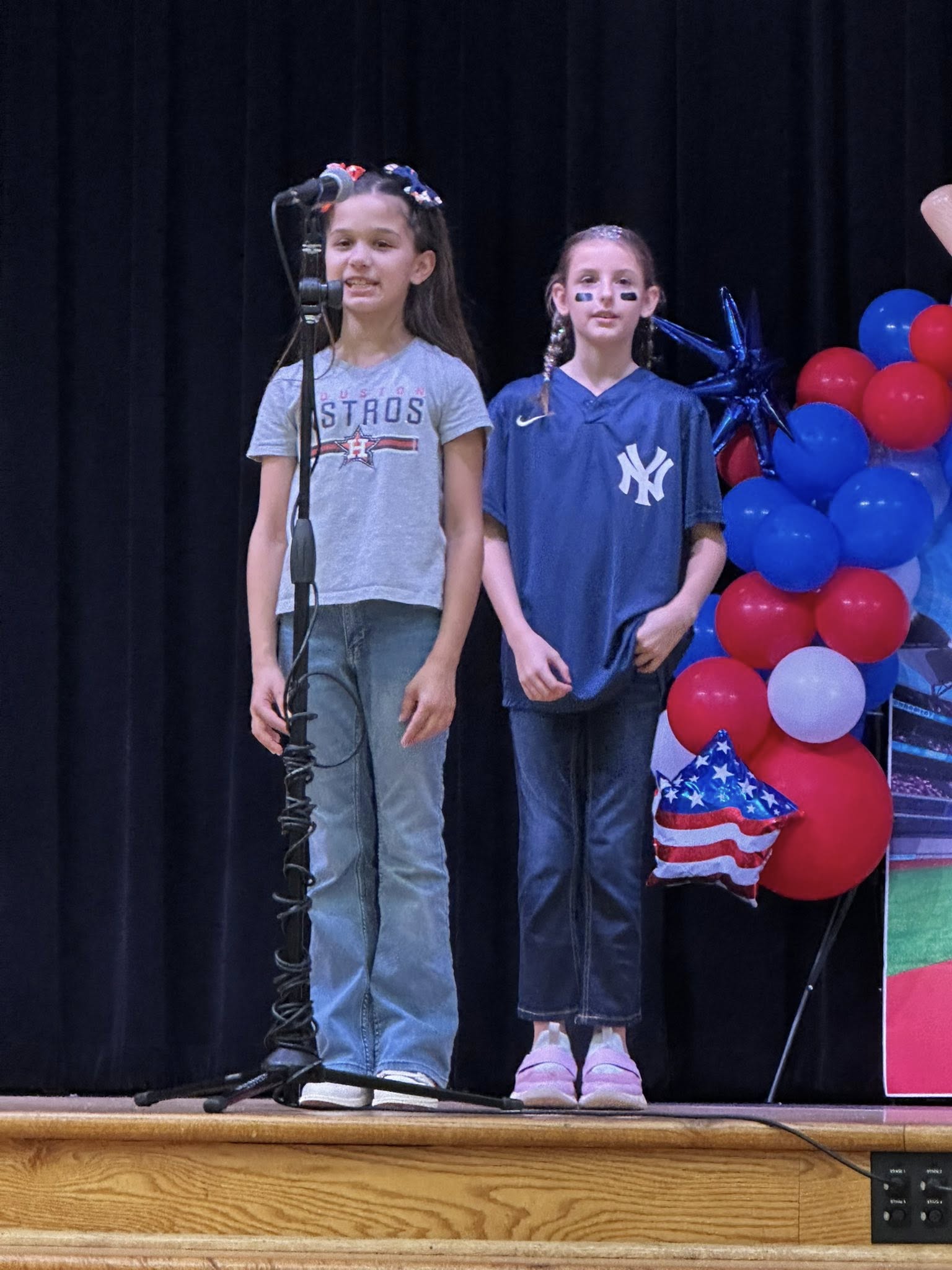 Students in 4th grade participating in a music program
