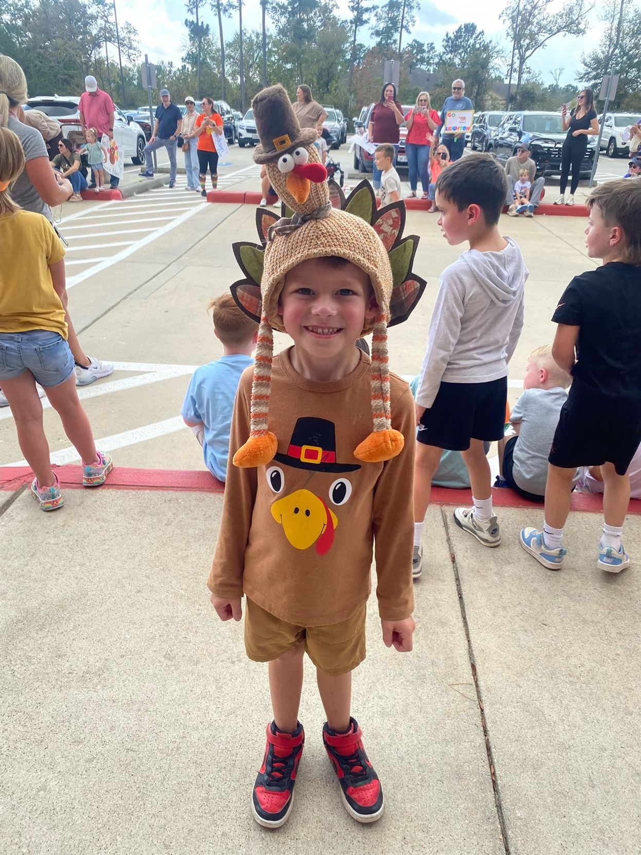 A student preparing to run in the turkey trot race in PE