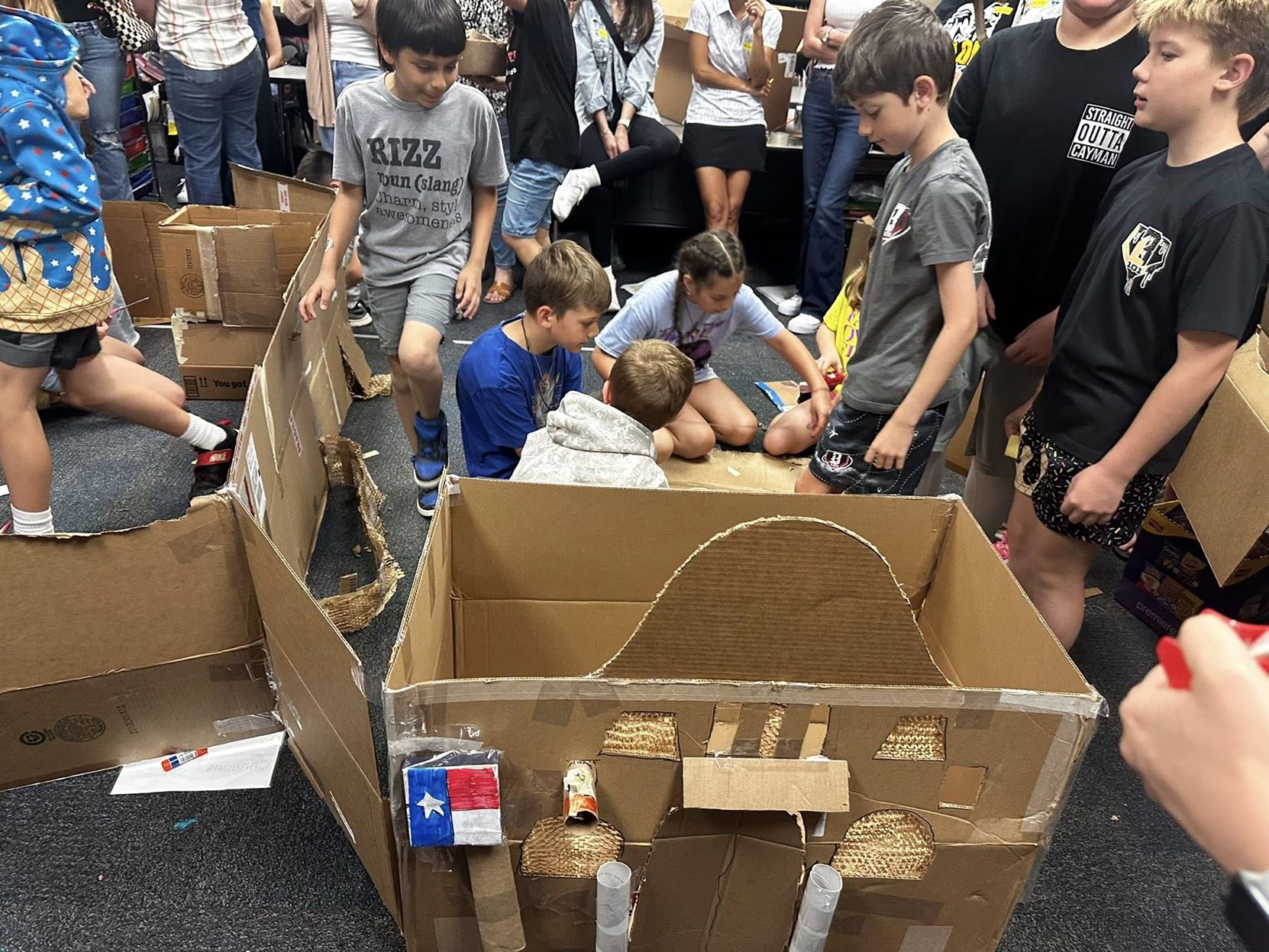 Students work with their families to build the Alamo out of cardboard